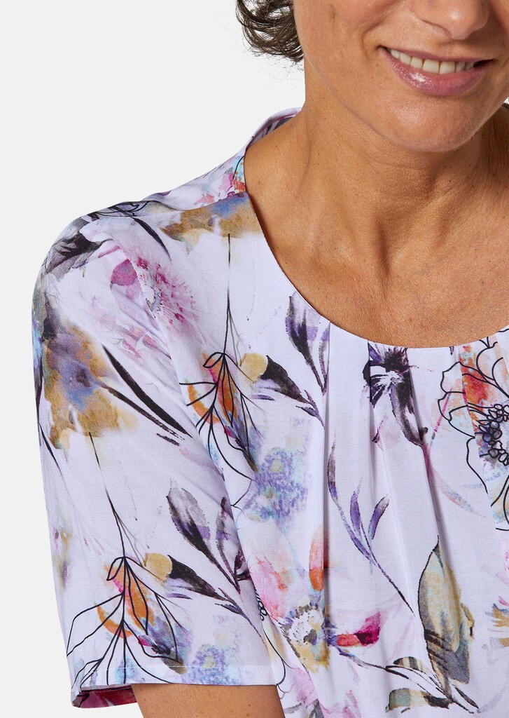 Expressieve blouse met verbloemende plooien 4