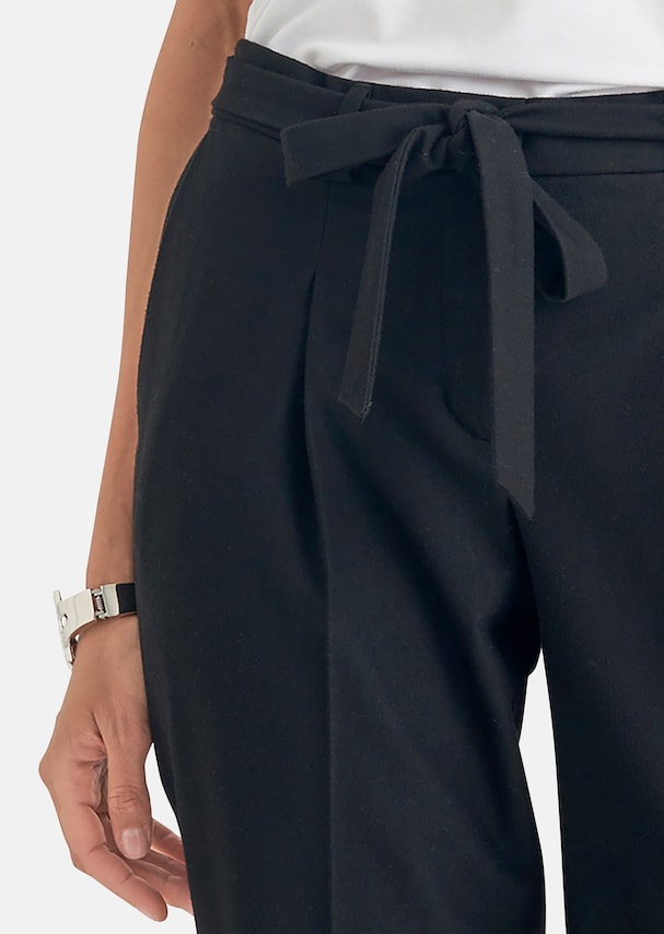Ankle-length pleated trousers 4