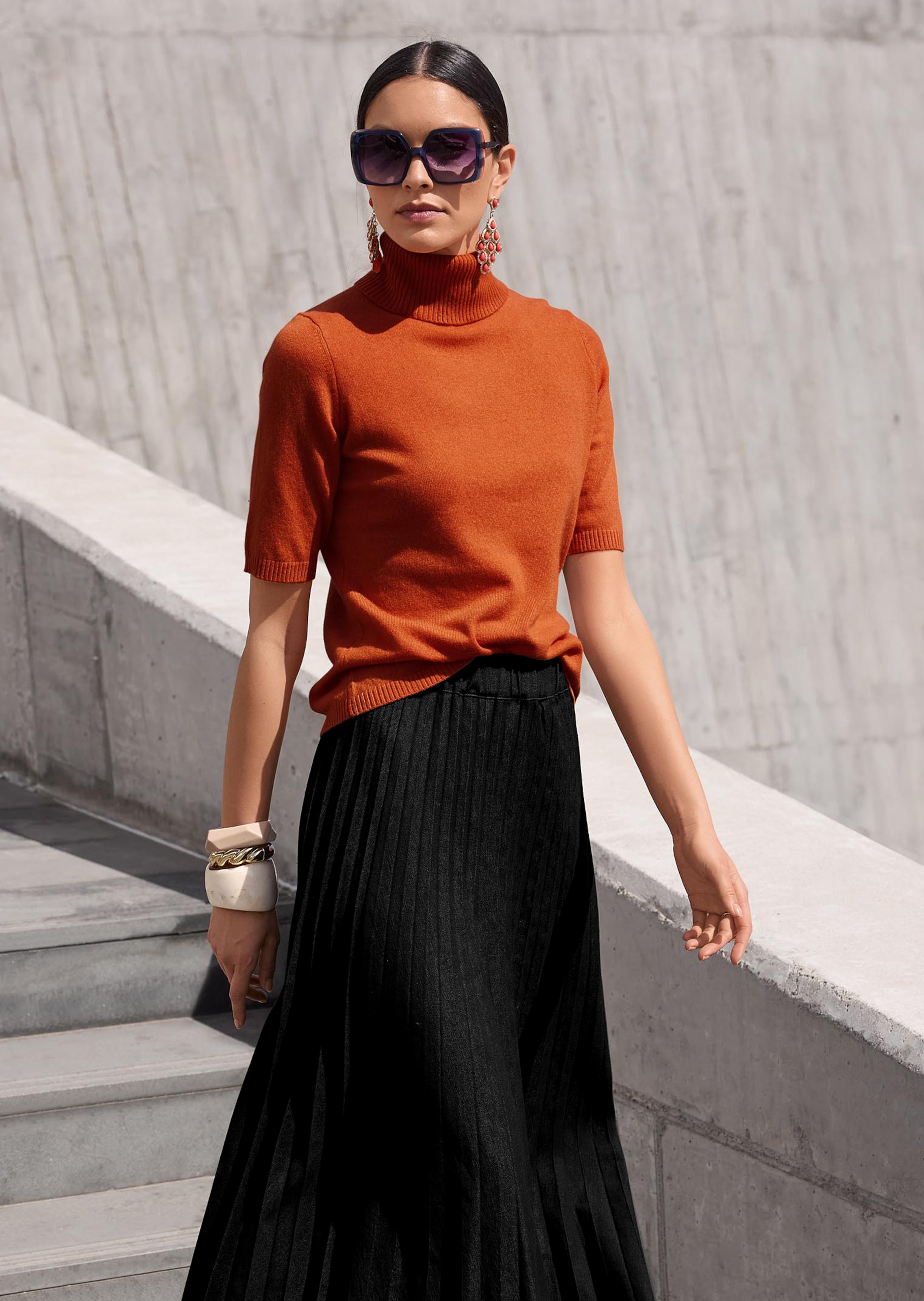 Flared denim skirt with pleats