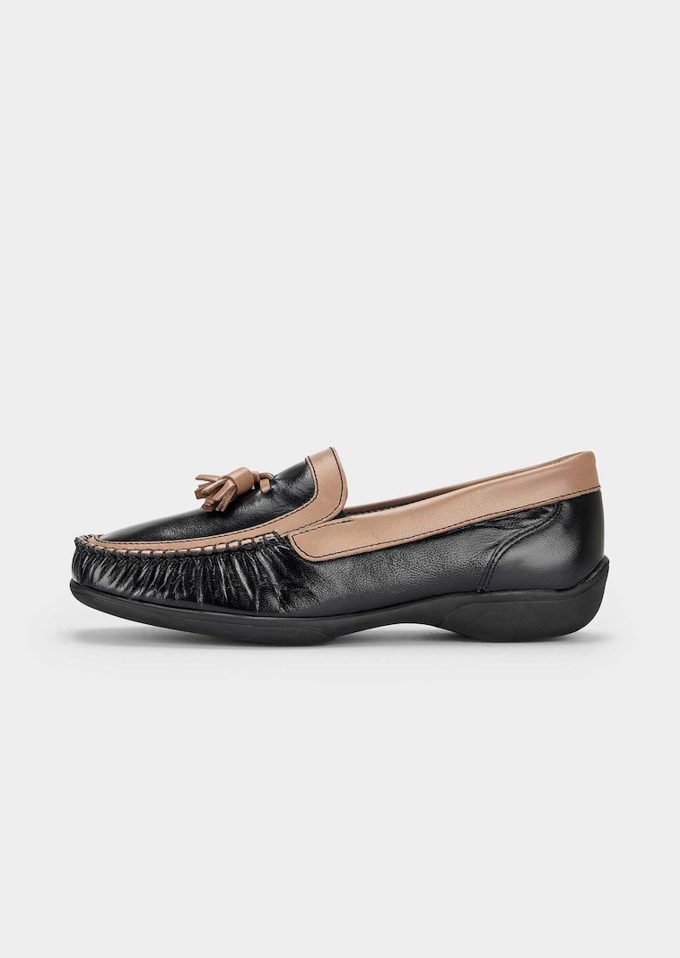 Mocassins en cuir avec pompons