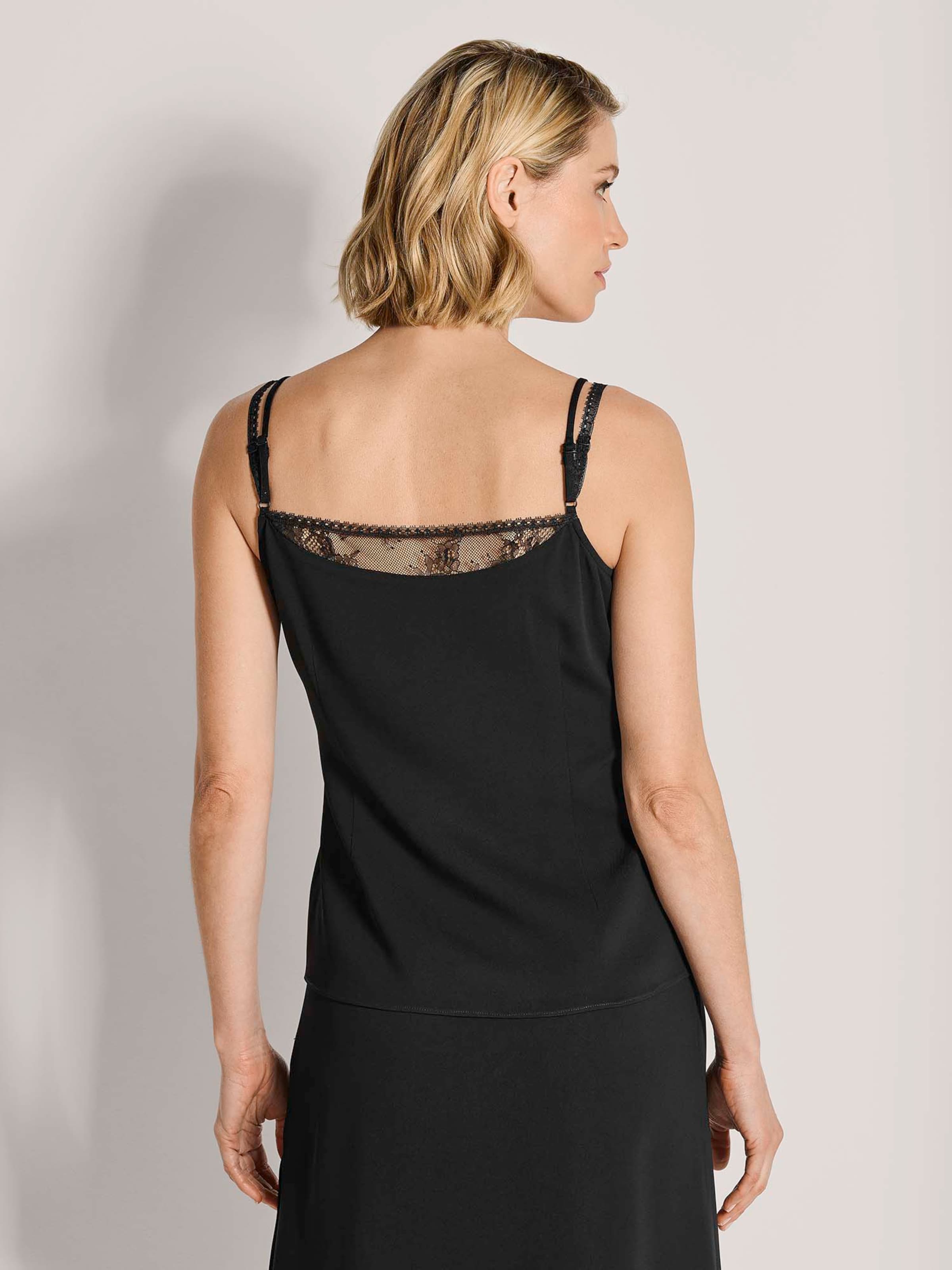 Lace cami top in black | MADELEINE Fashion