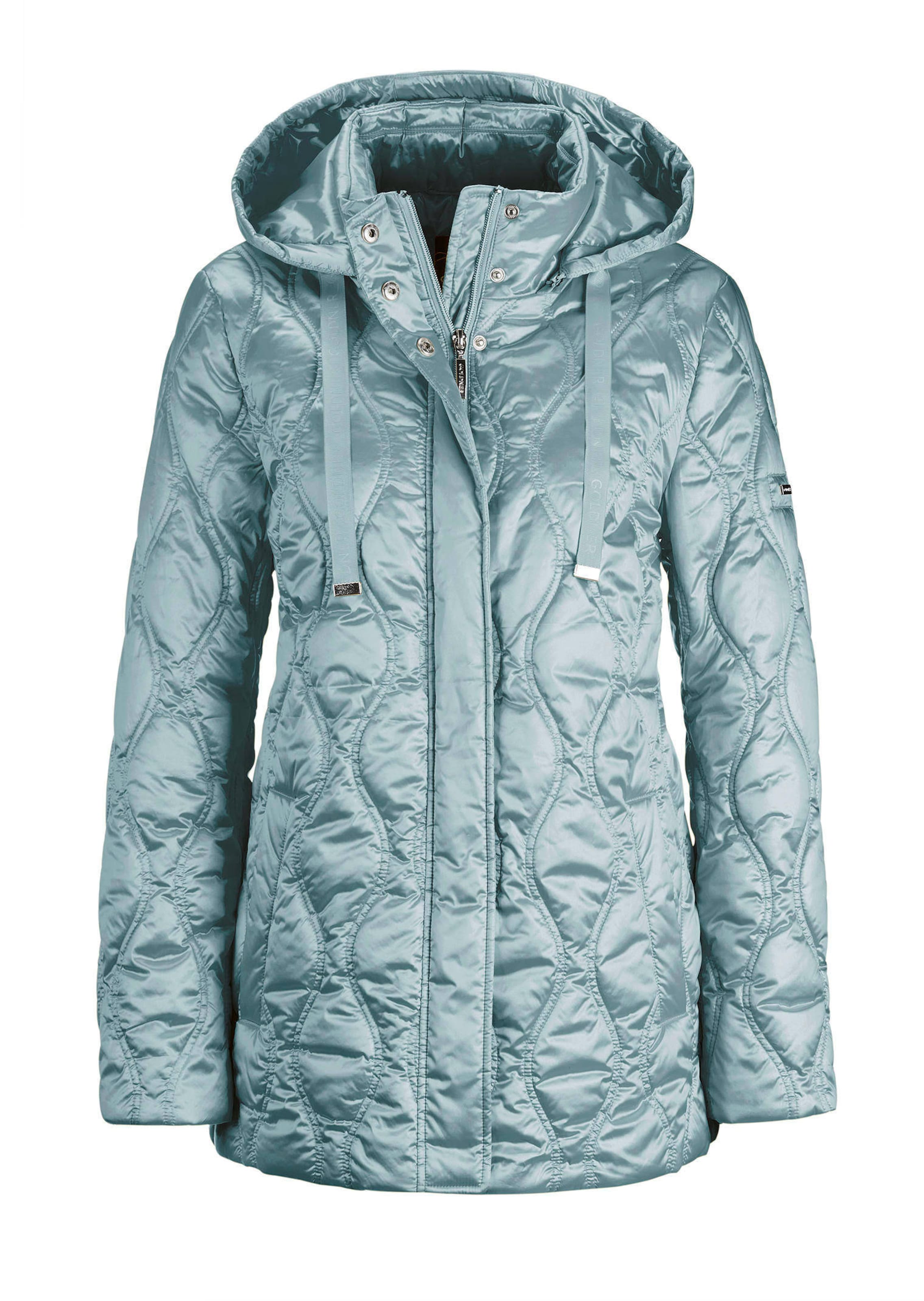 Veste matelassée avec surpiqûres ondulées