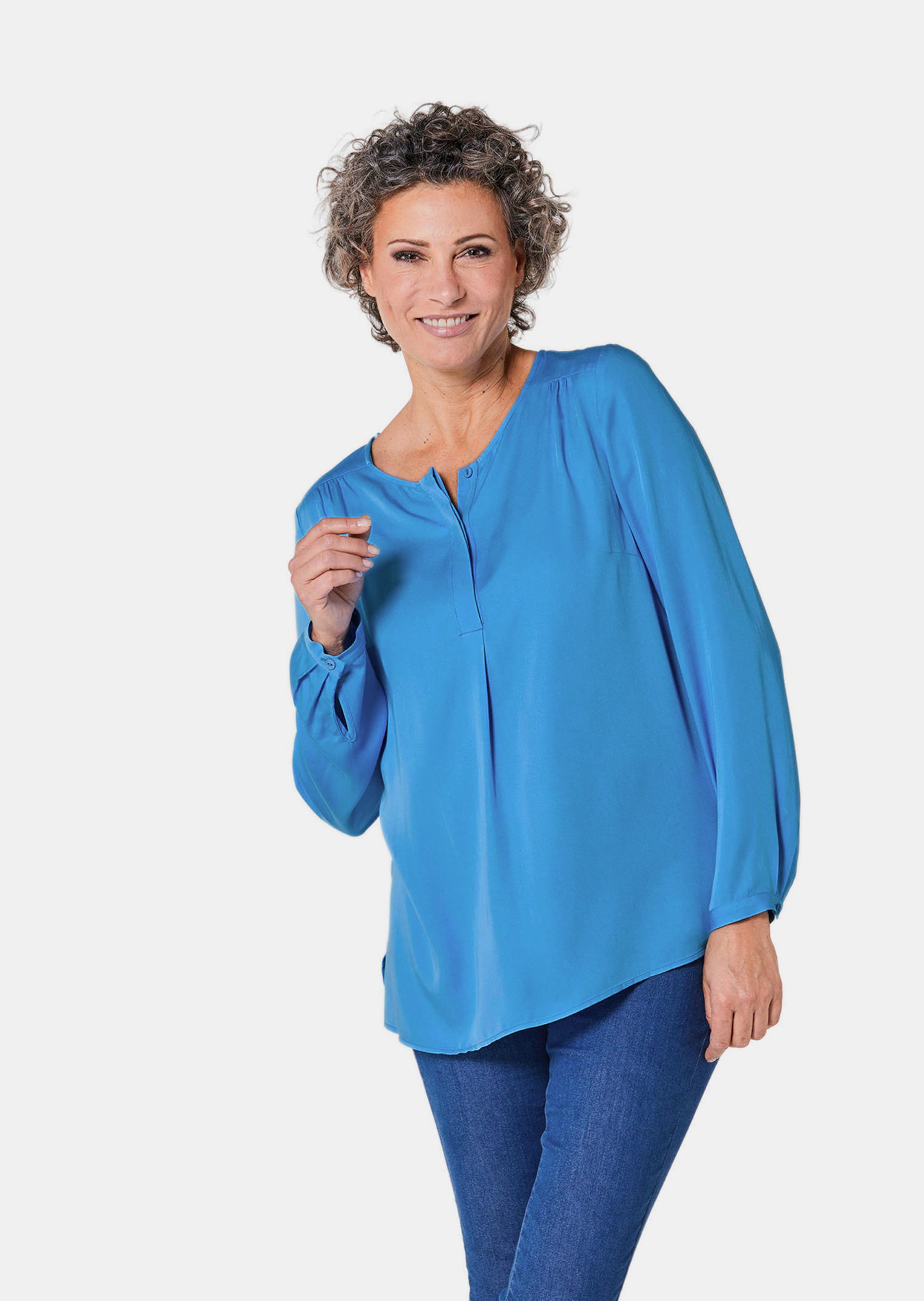 Flatteuze blouse zonder sluiting met modieuze kraag in blauw