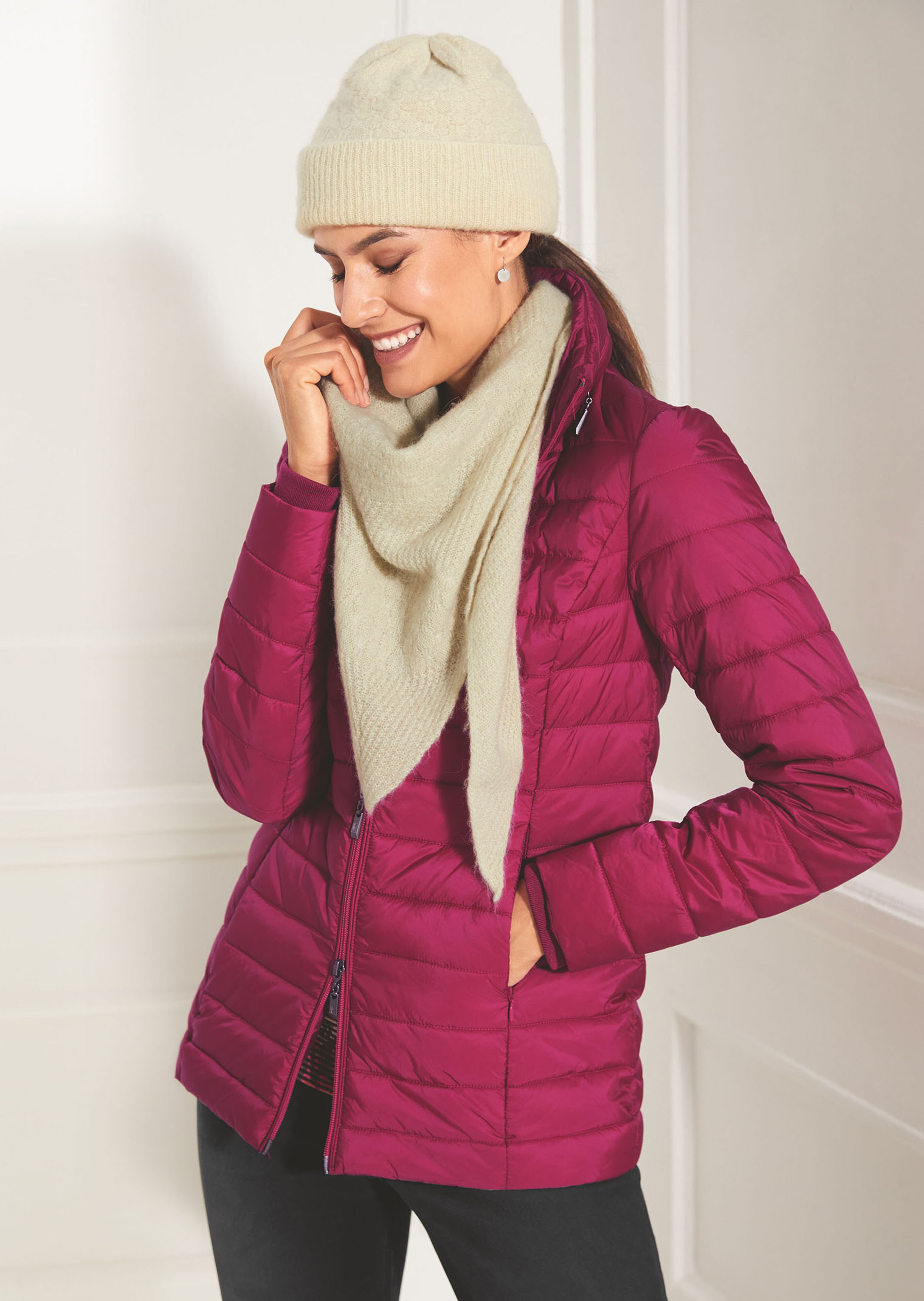 Warm gewatteerde bodywarmer met capuchon