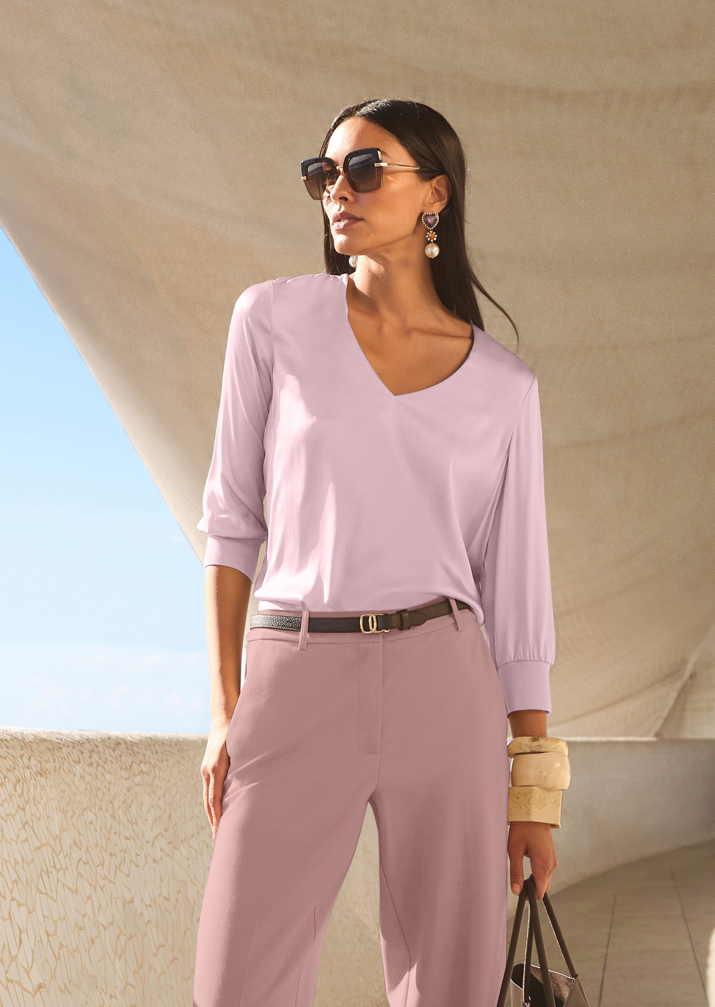 Blouson top made of stretch silk with a V-neckline