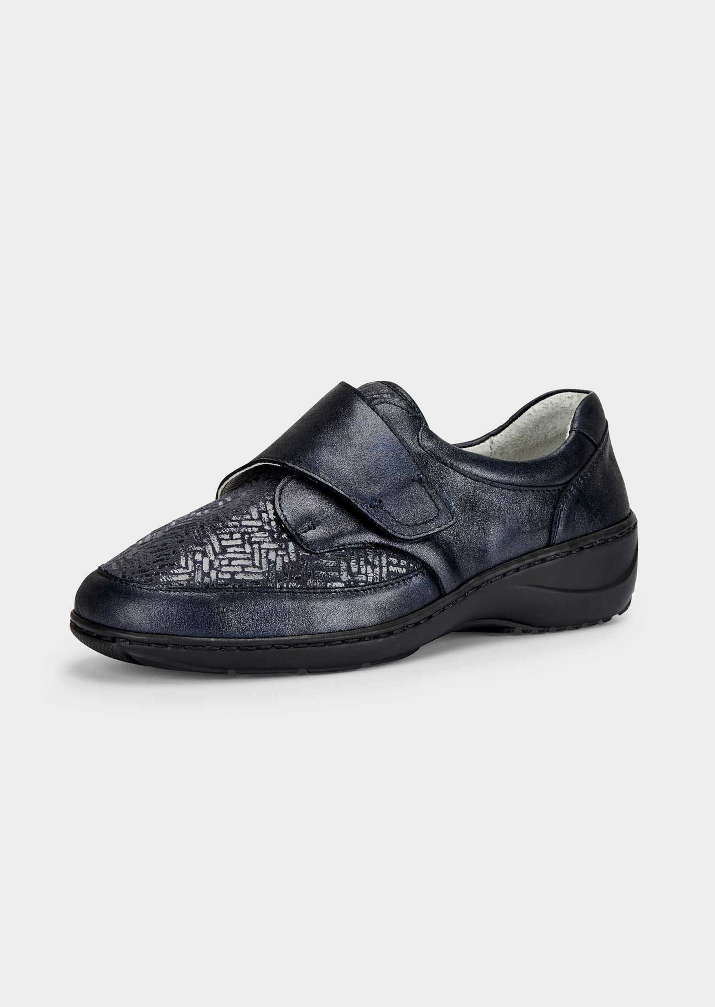 Chaussures basses avec large fermeture velcro