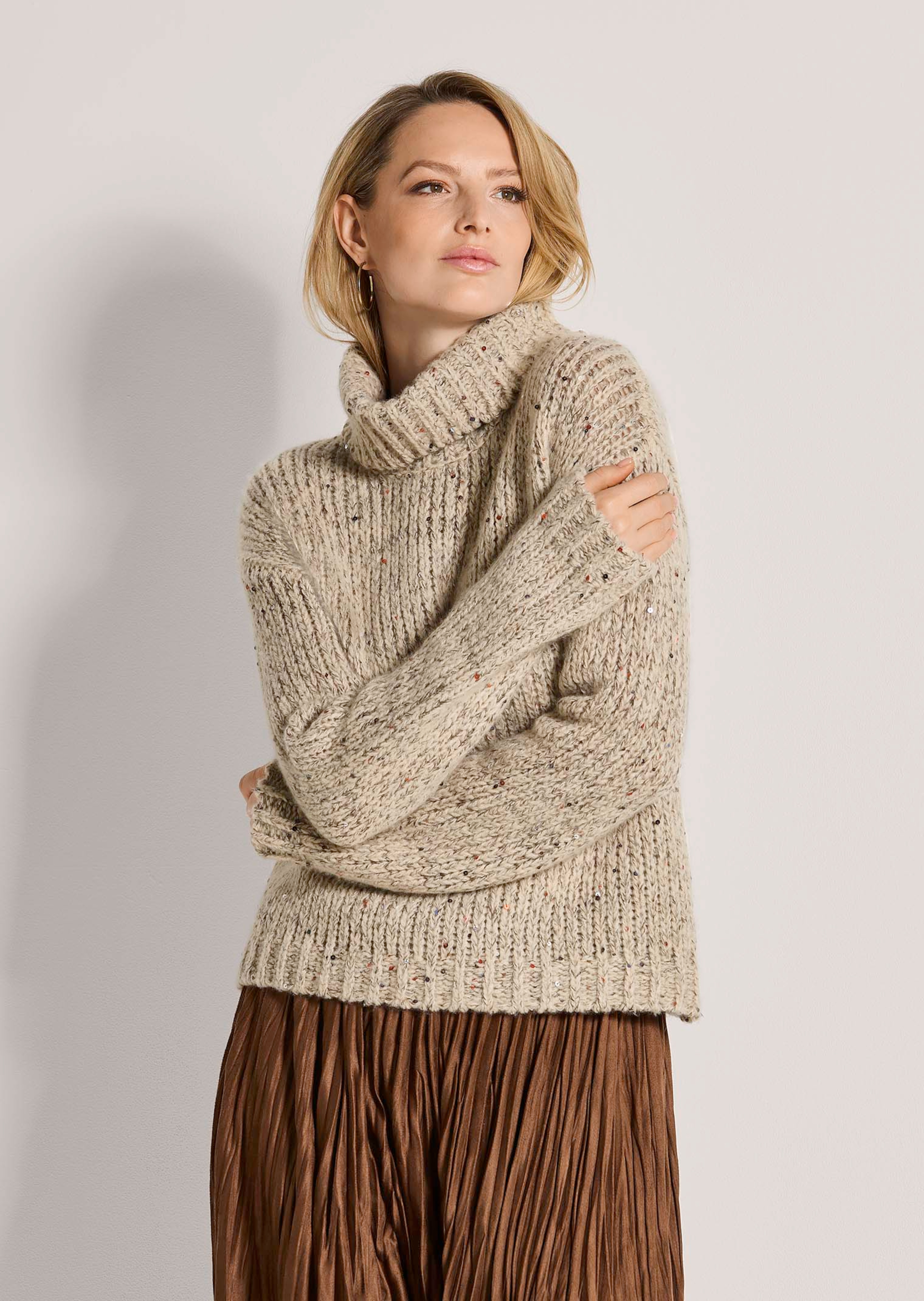 Rollkragenpullover mit Pailletten
