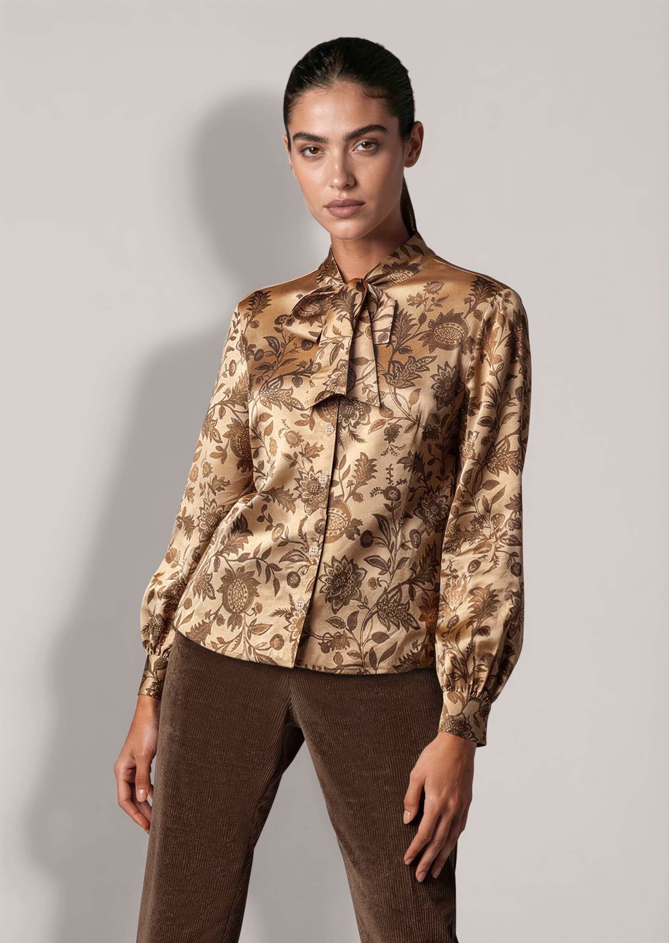 Schluppenbluse mit floralem Print
