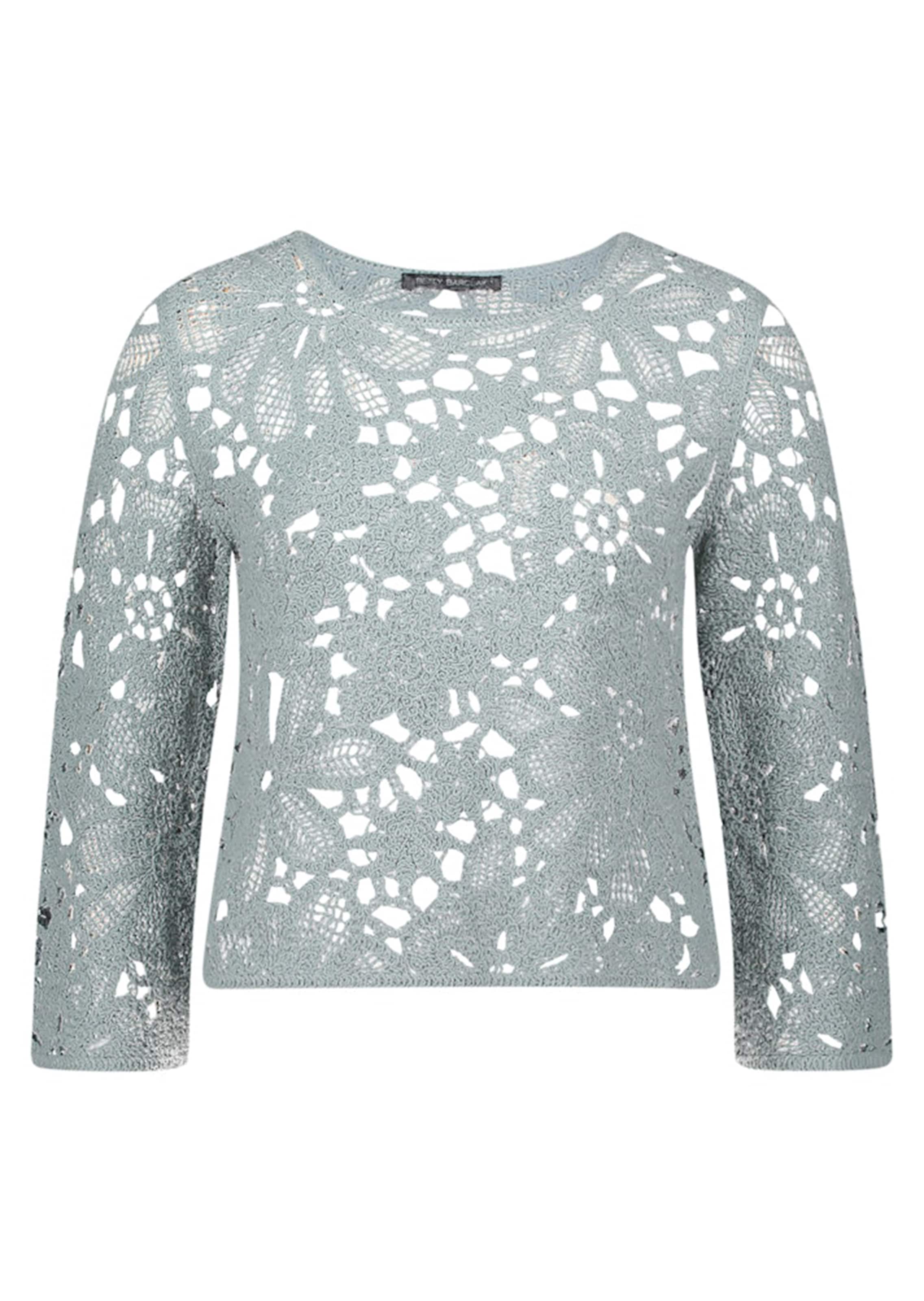 Häkelpullover mit Blütenmuster