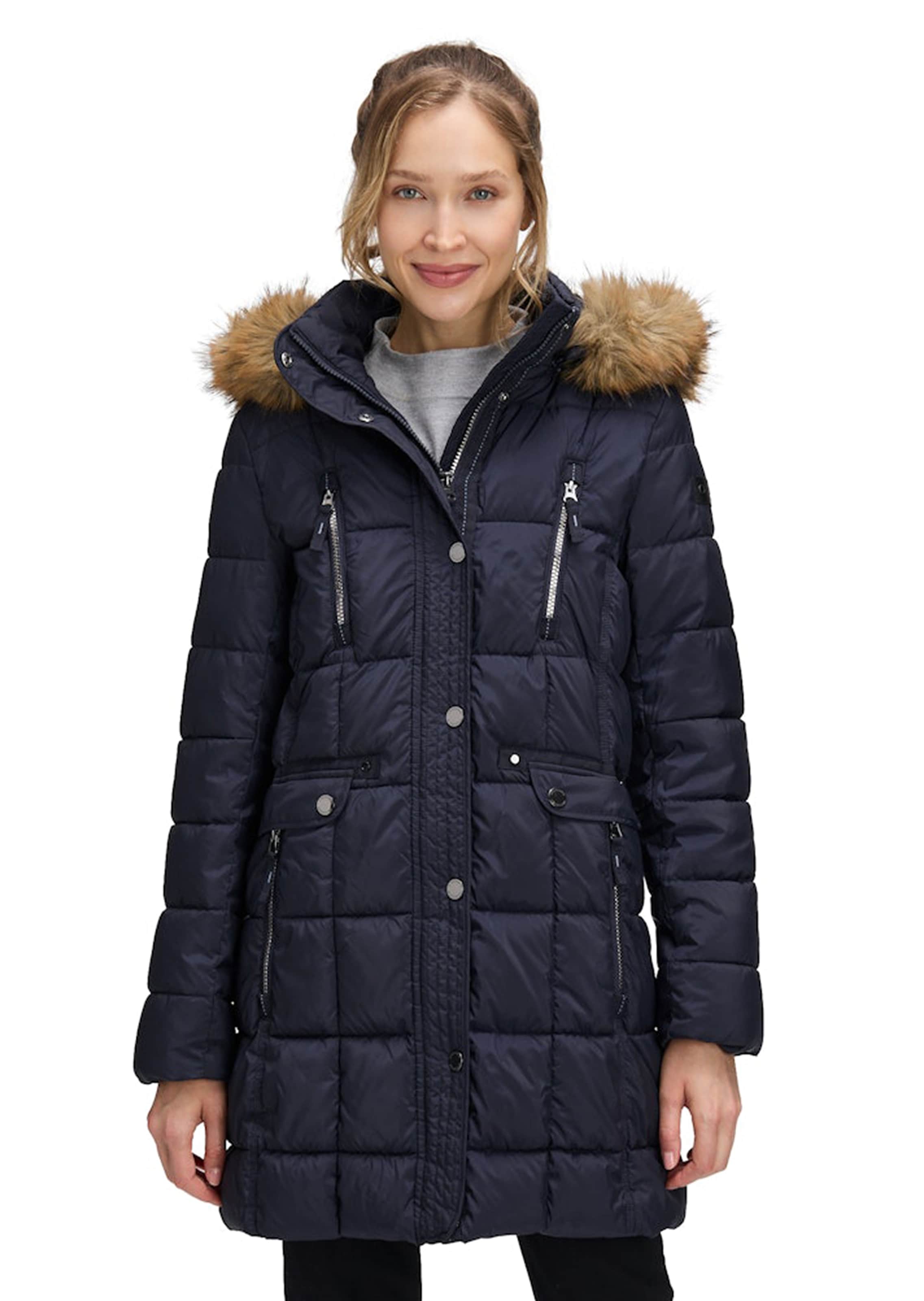 Manteau matelassé avec de nombreuses poches zippées