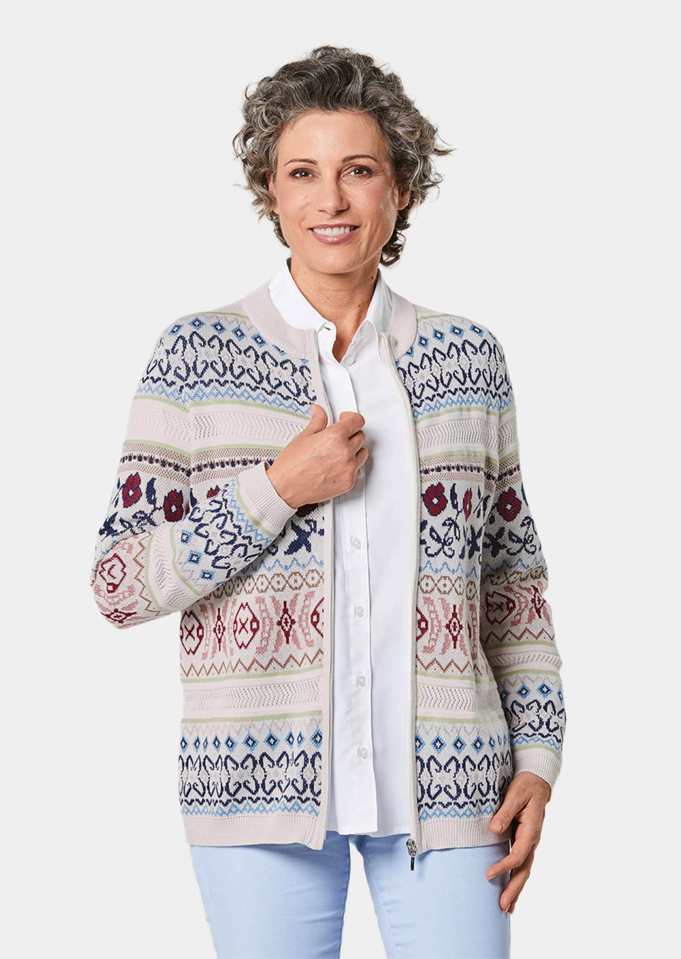 Liebenswerte Strickjacke mit Ajourmuster