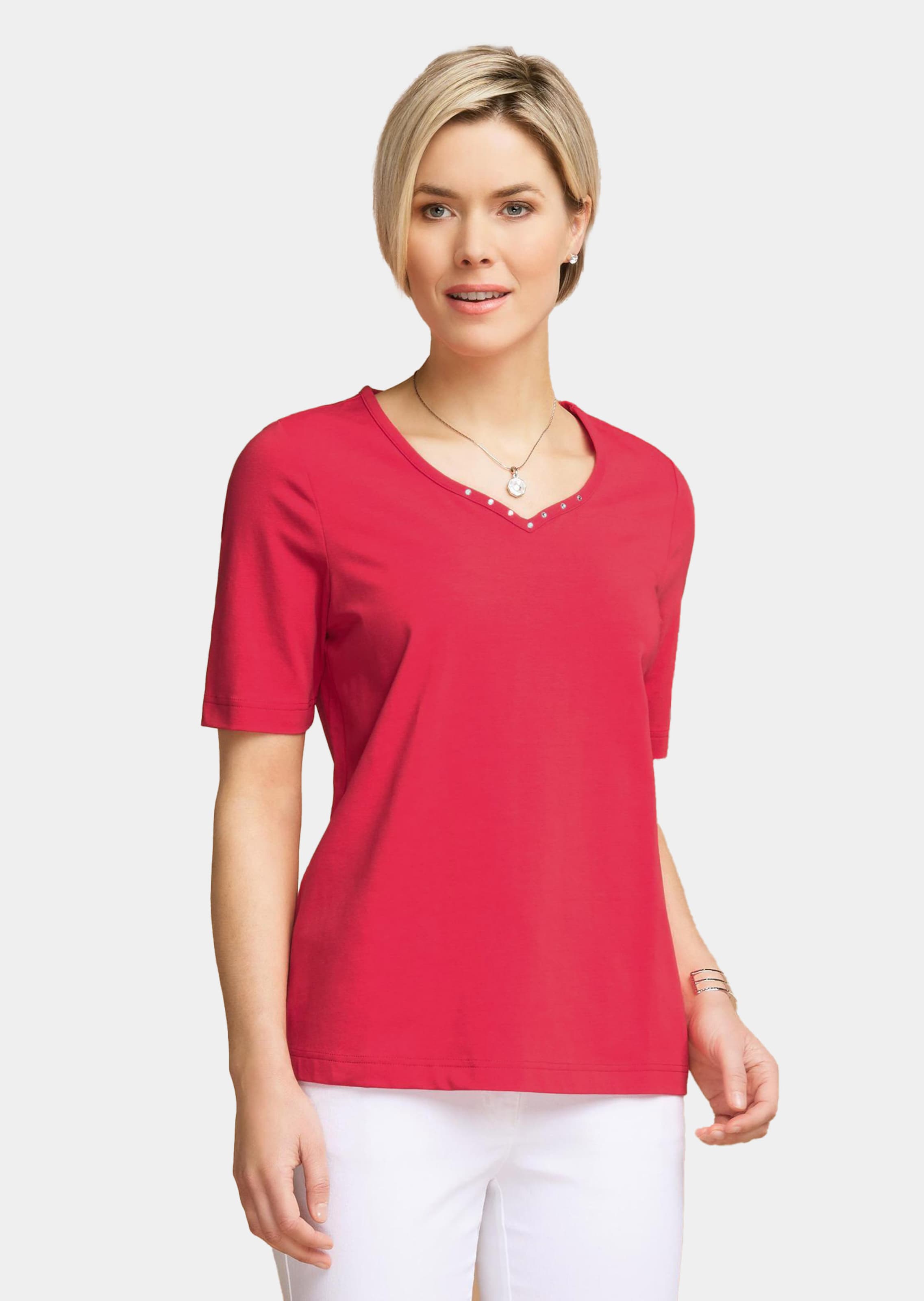 T-shirt avec charmante encolure et pierres décoratives