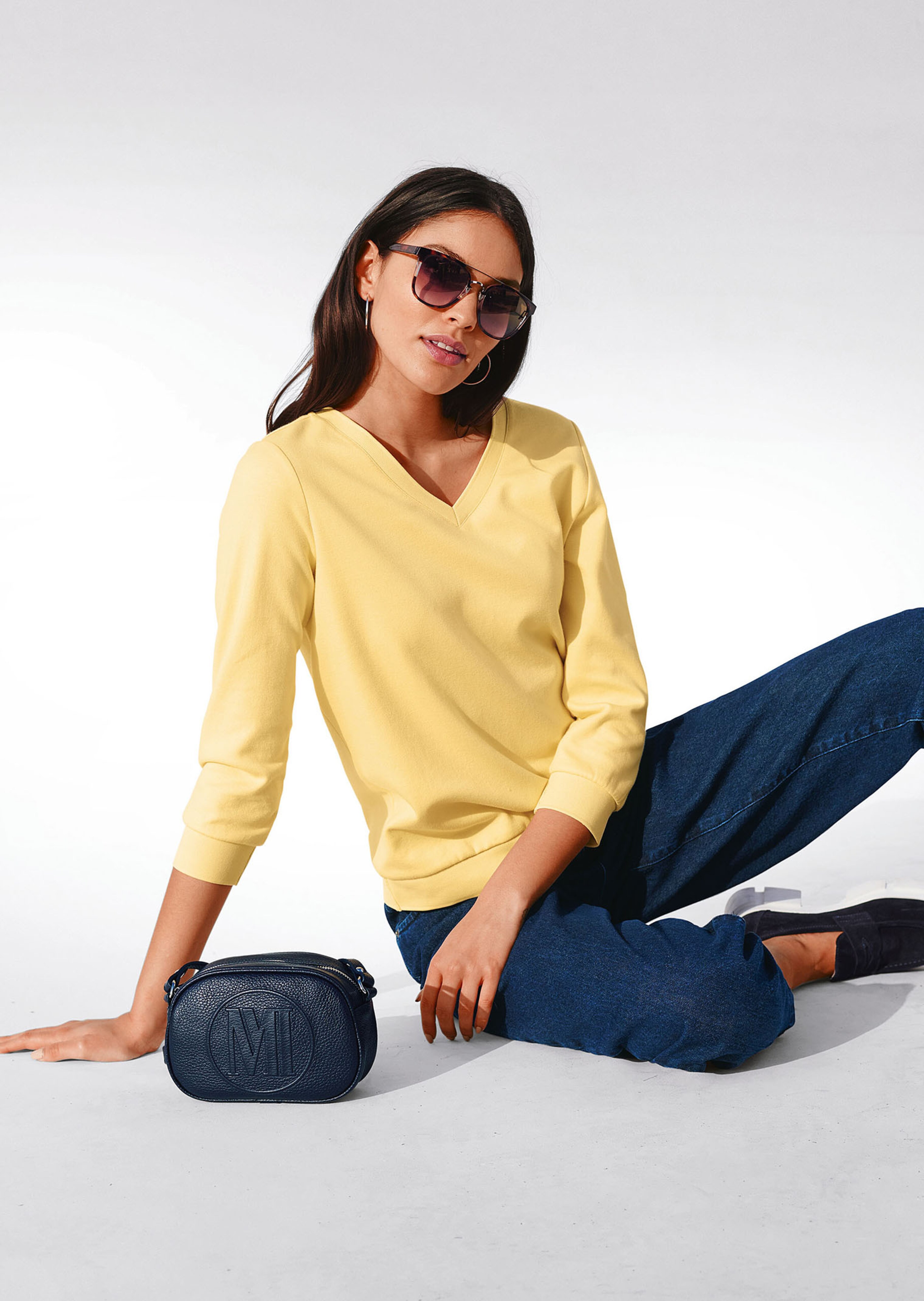 Sweatshirt mit 3/4-langen Ärmeln.