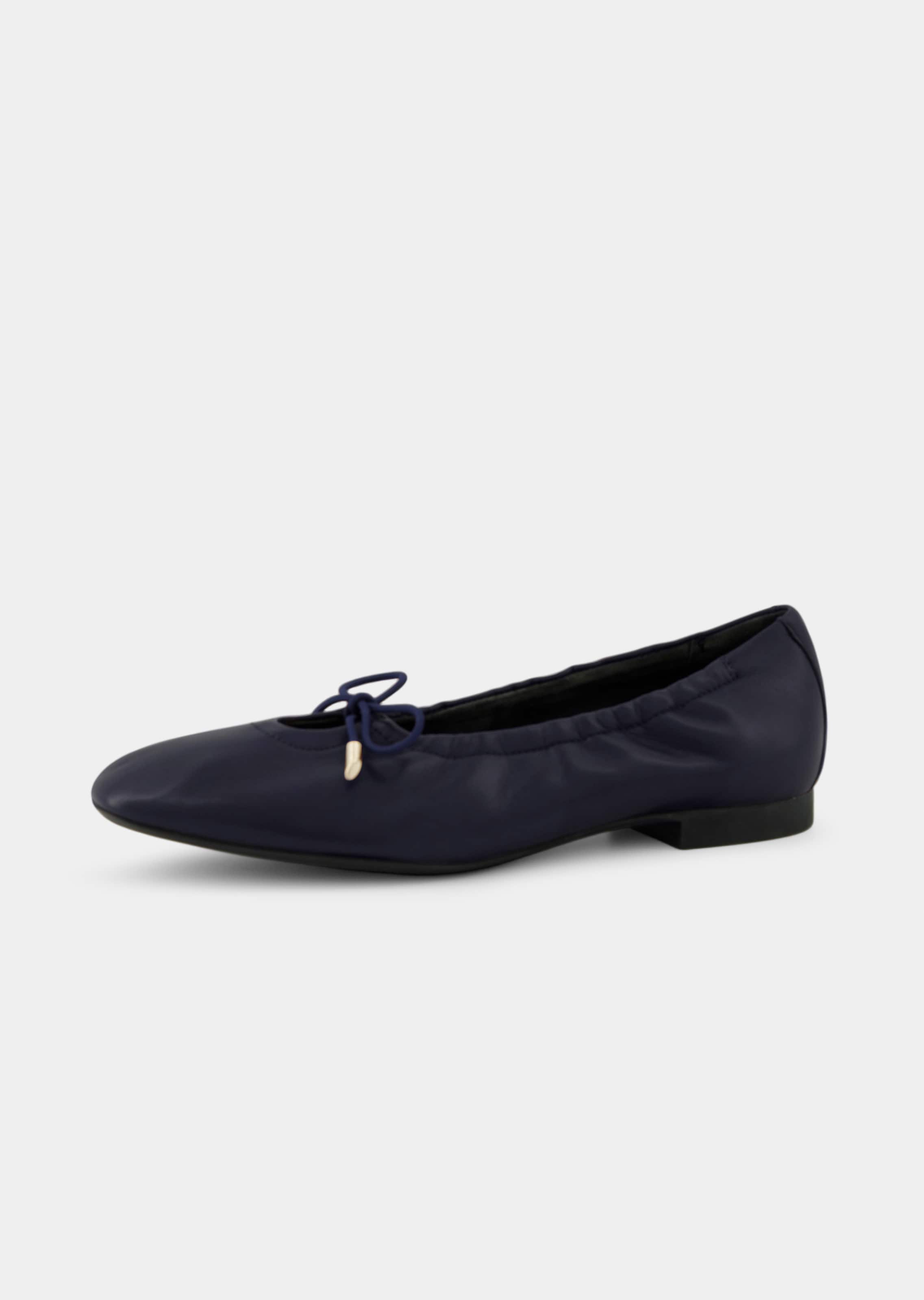 Ballerines en cuir avec un nœud classique