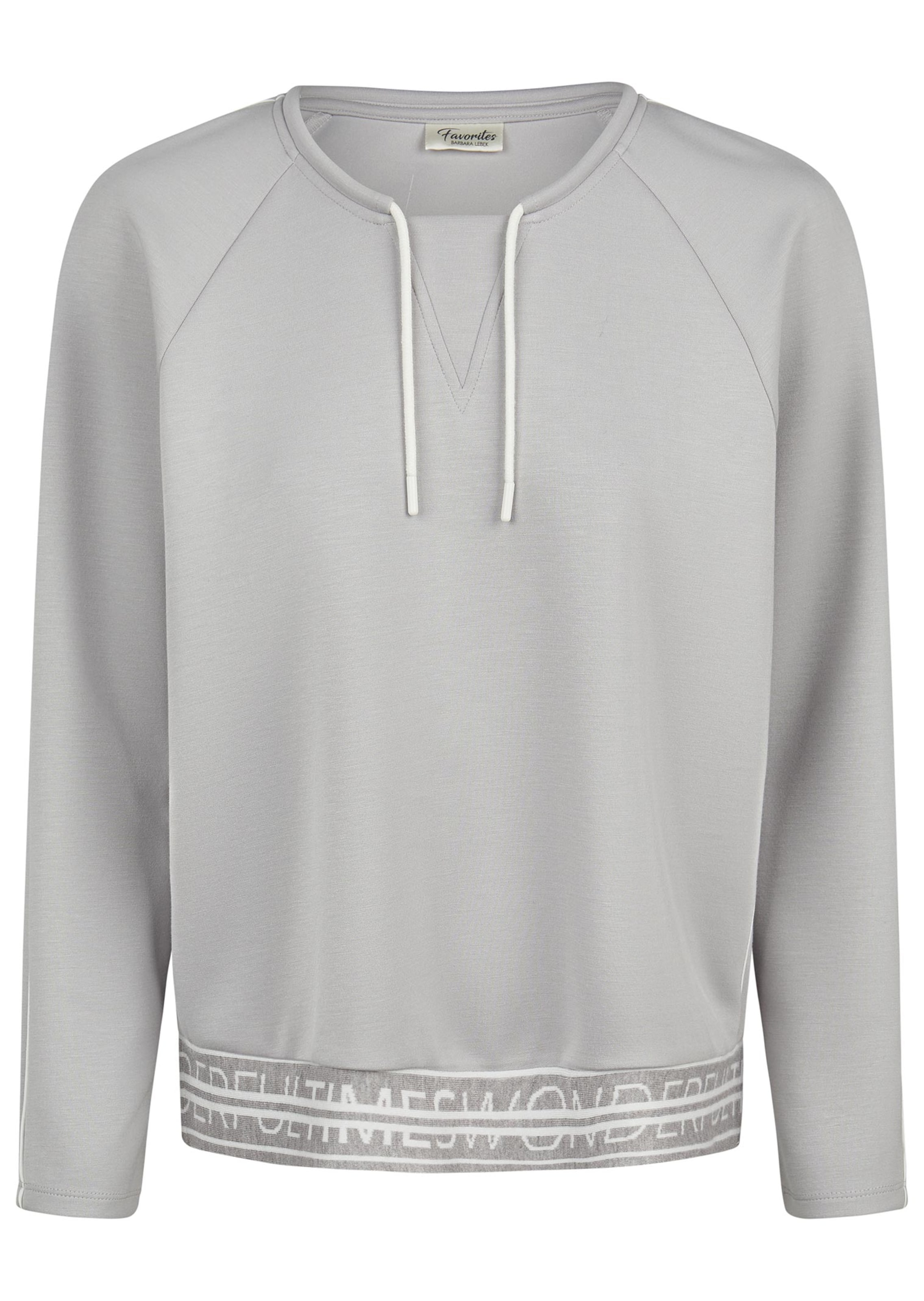 Sweat-shirt avec lien de serrage et passepoils