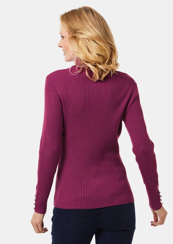 Eleganter Rollkragenpullover mit optischen Knöpfen