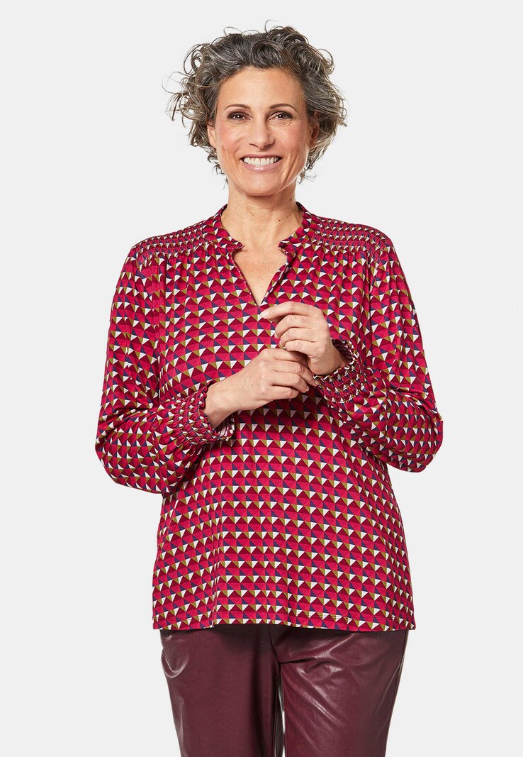 Jersey blouse met modieuze smokwerkdetails
