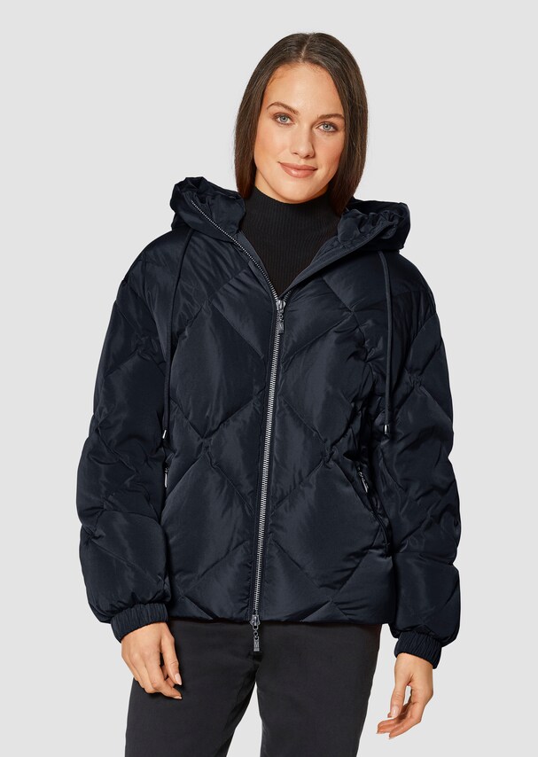 Short oversize quilted jacket with a hood