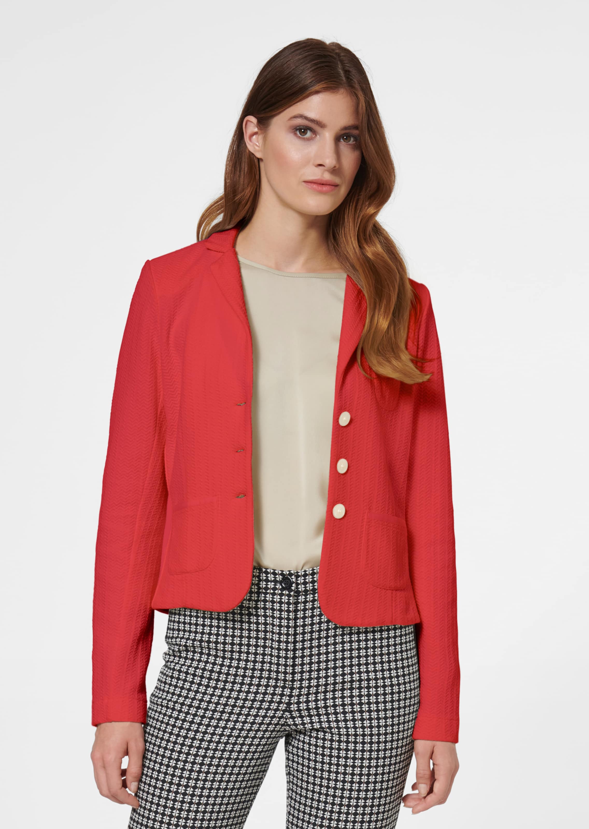 Korte jersey blazer met modieuze structuur