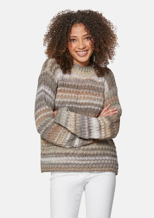 Jumper with a lace knit pattern and sequin accents