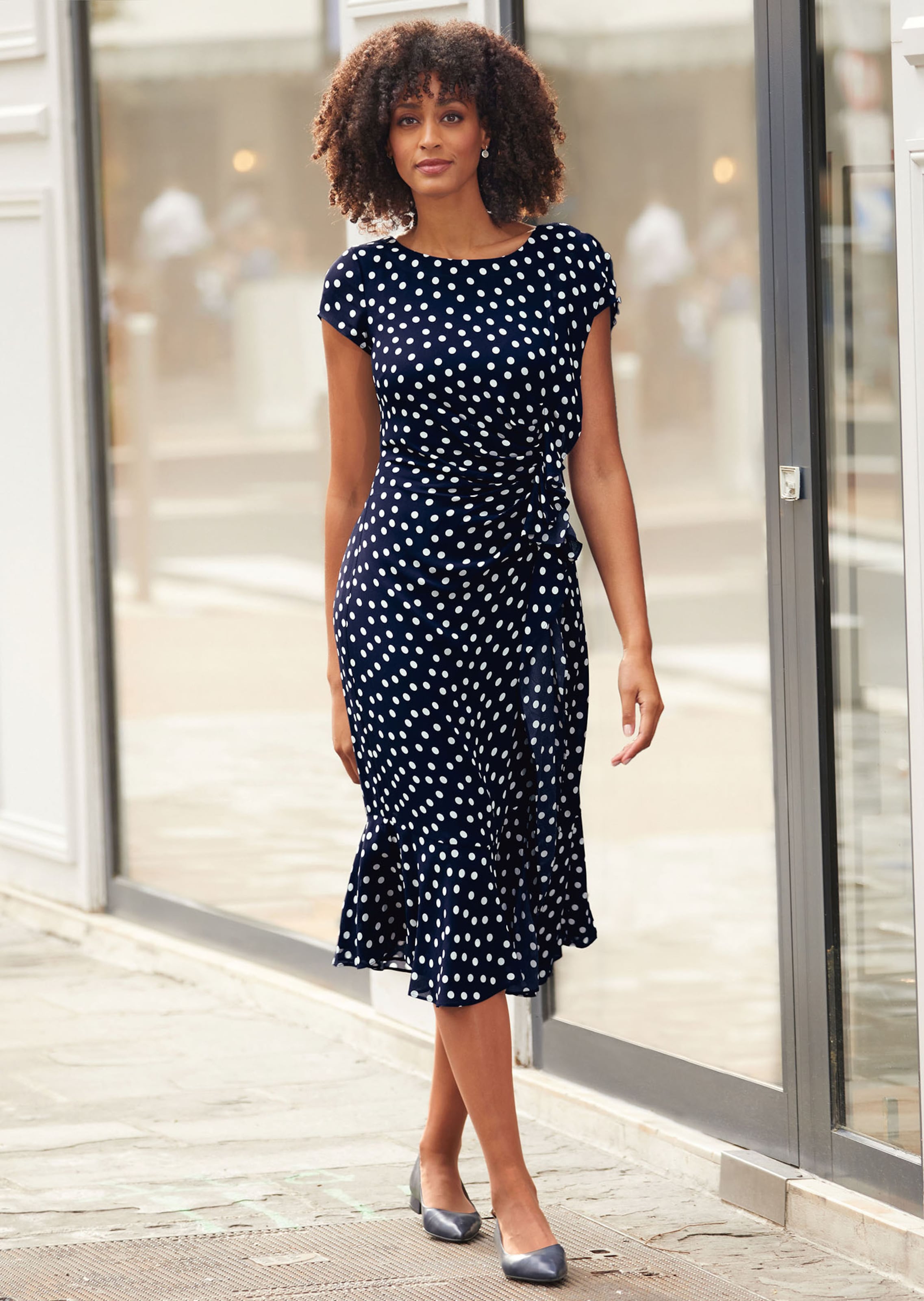 Summer dress with polka dot print and flounces in navy white