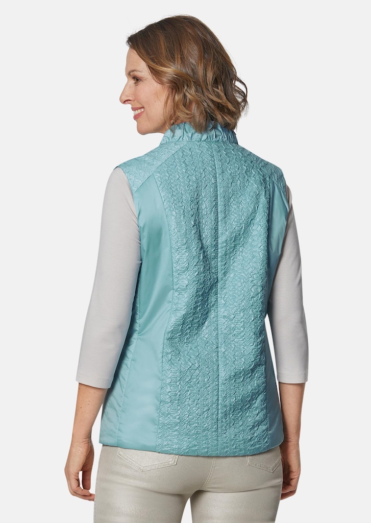 Licht vest met mooie plooien
