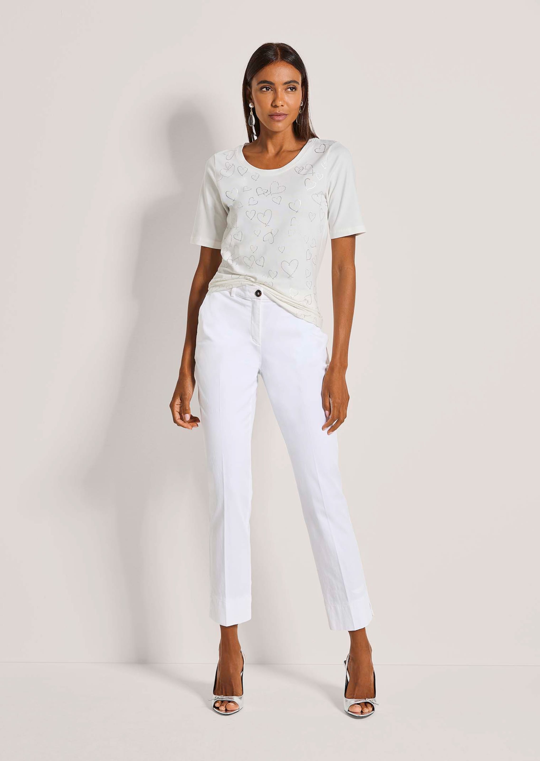 Top with heart print in natural white | MADELEINE Fashion