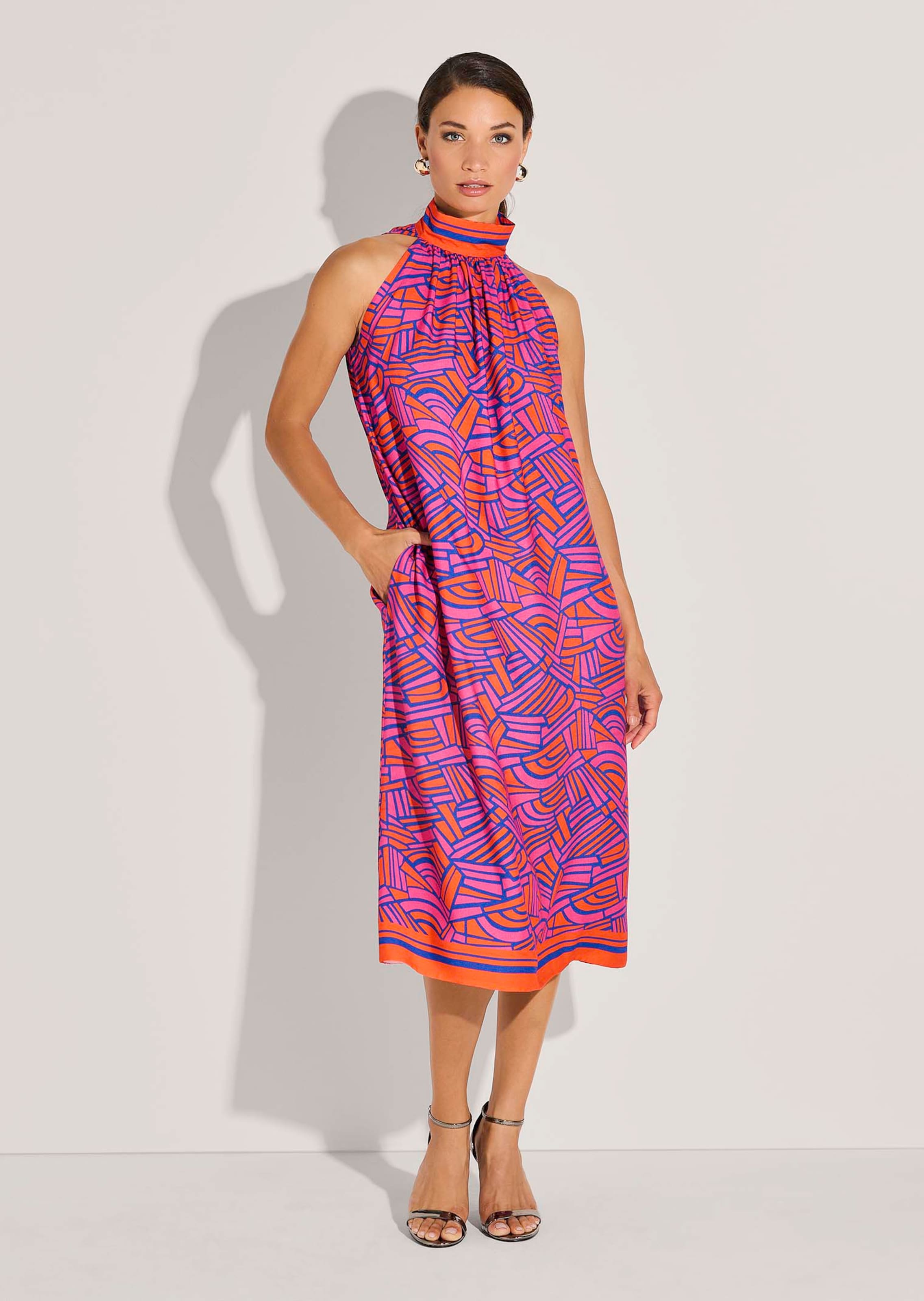 High-neck summer dress with graphic print in blood orange / royal blue /  coral pink | MADELEINE Fashion