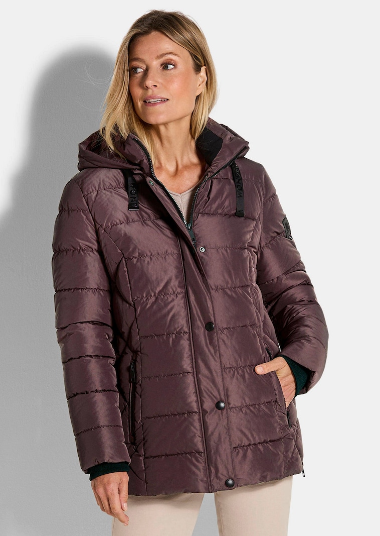 Tikkitakki vetoketjullisilla taskuilla