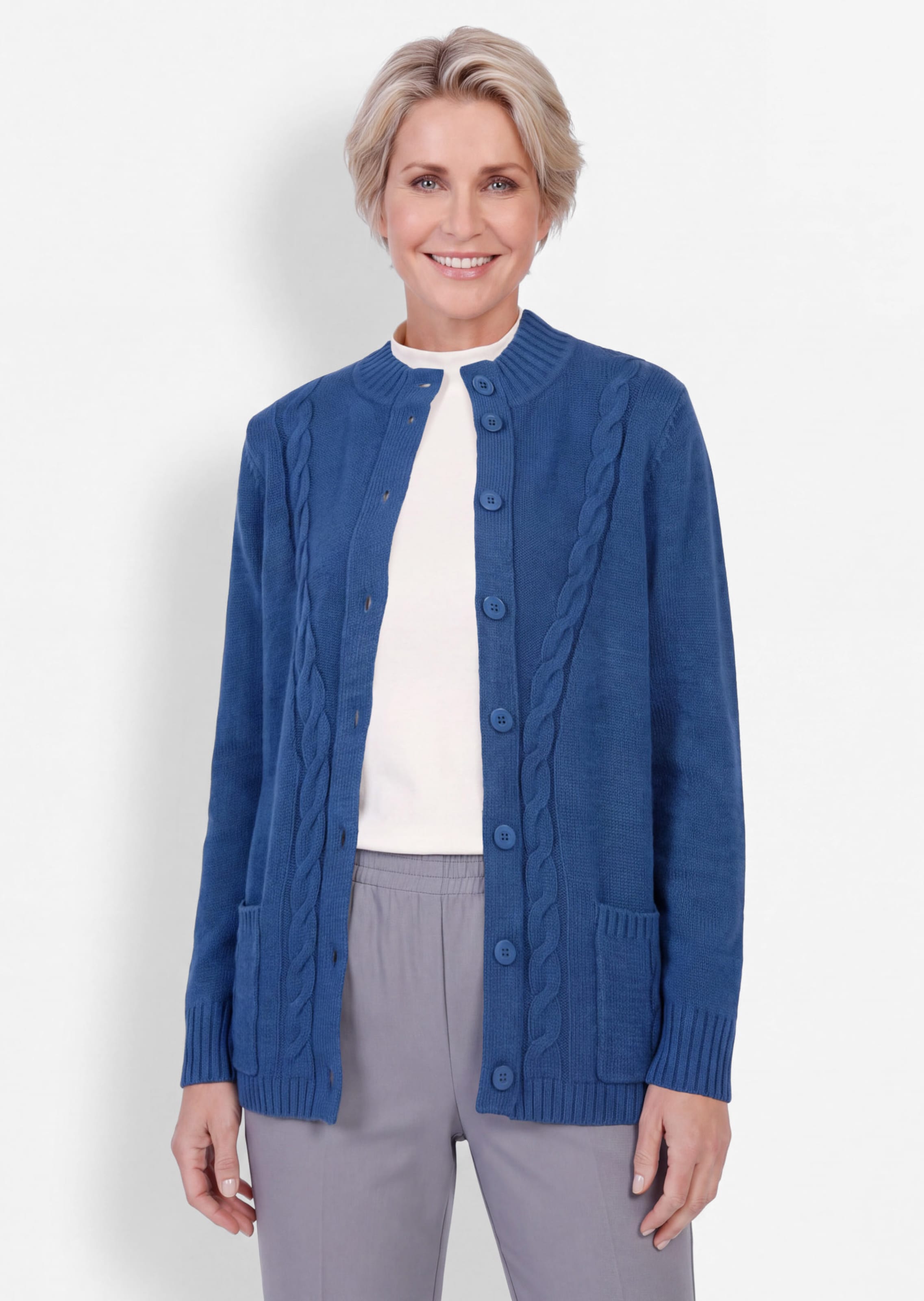 Tricot jasje met gevlochten kabelpatroon