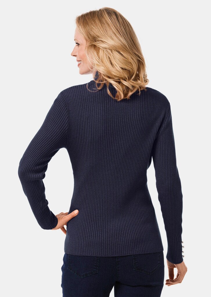 Eleganter Rollkragenpullover mit optischen Knöpfen