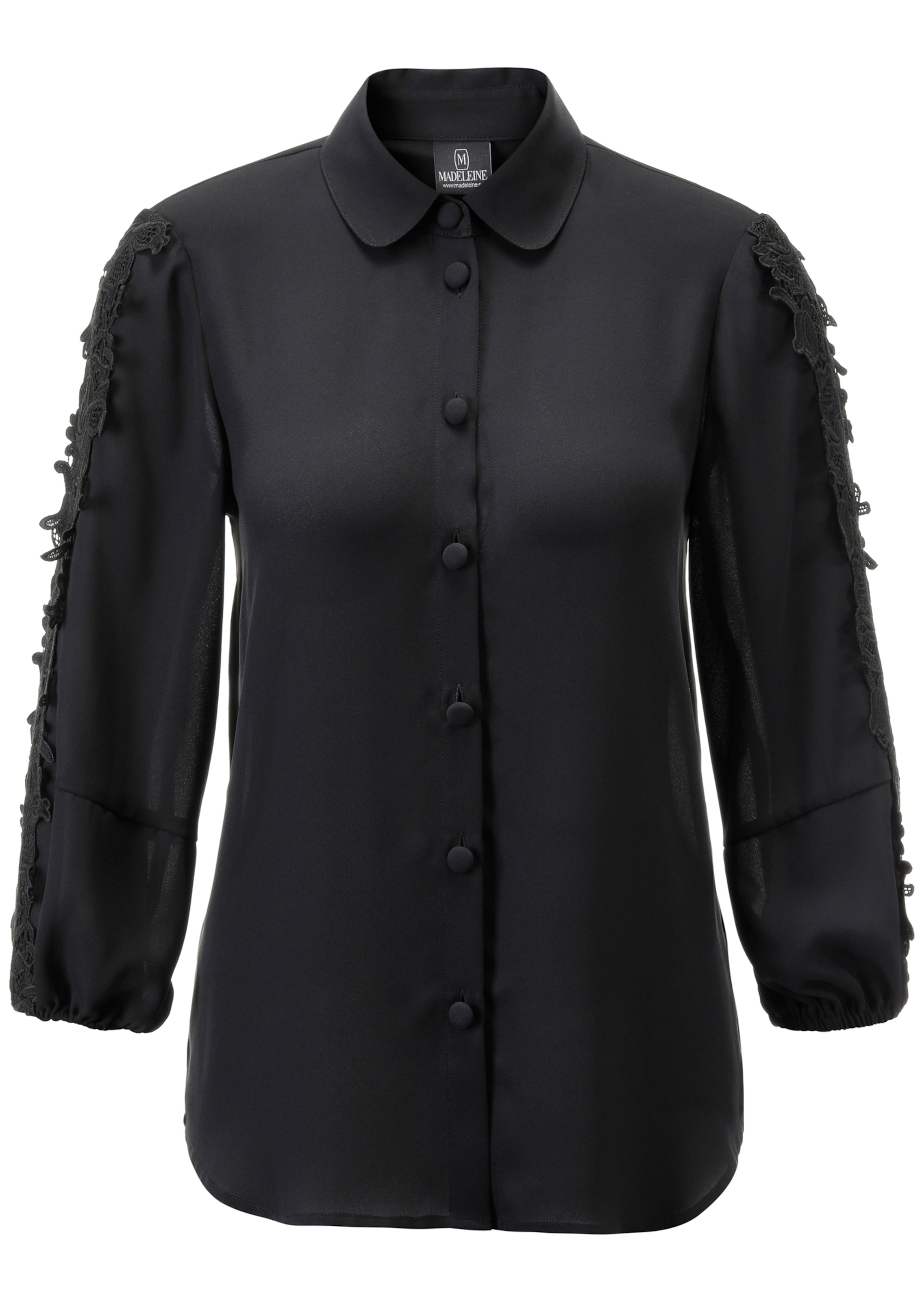 Bluse mit Spitze am Ärmel