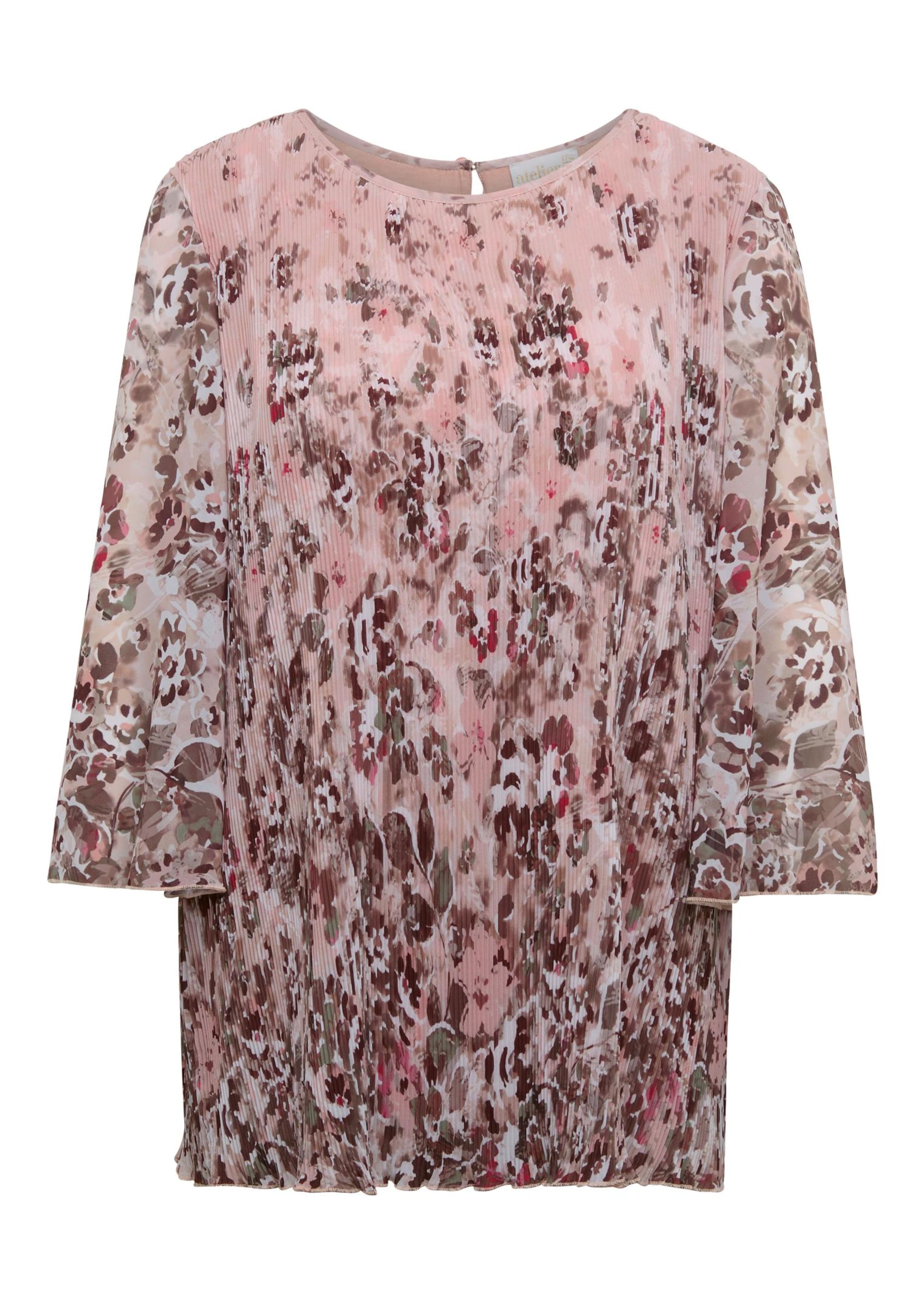 Aufregende Feinplisseebluse