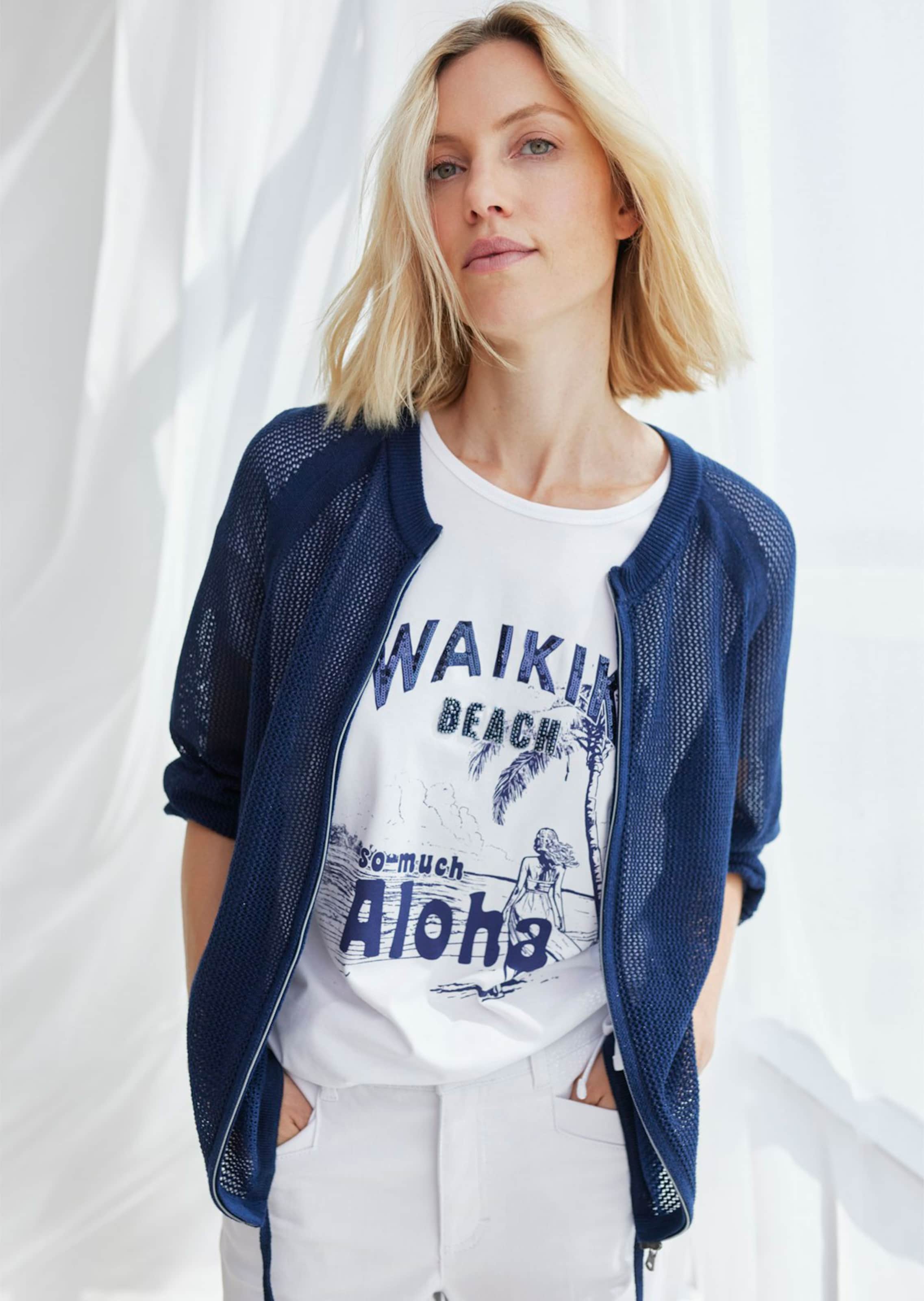 Veste en tricot transparente avec fil brillant