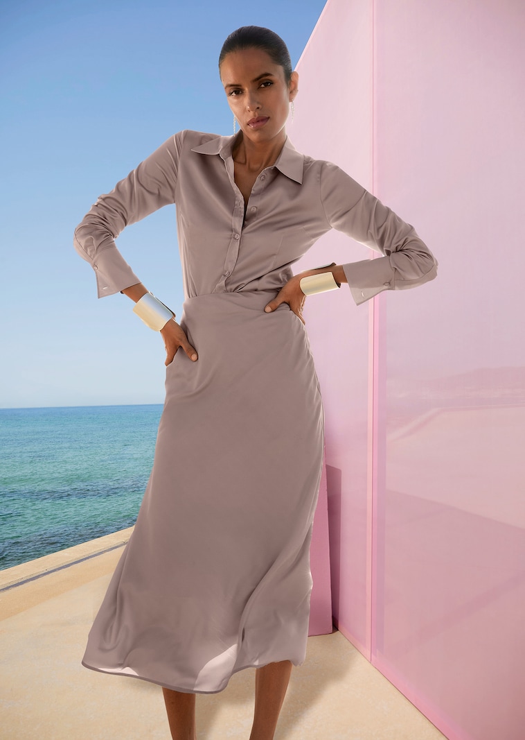 Langer Rock in glanzvoller Optik