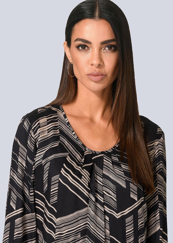 Kleid mit grafischem Druck 6