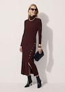 Figure-hugging knitted dress with decorative buttons and slit thumbnail 4