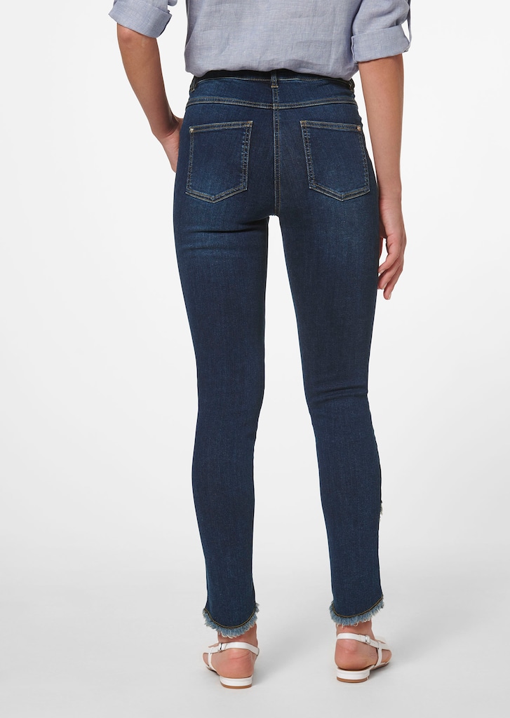 Slim jeans with fringed hem 2