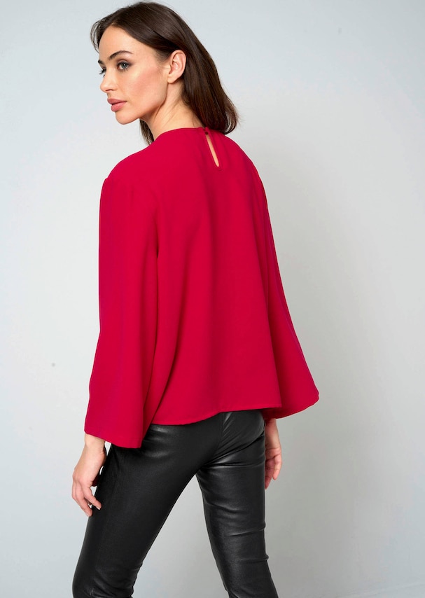 Bluse mit Perlenmotiv 2