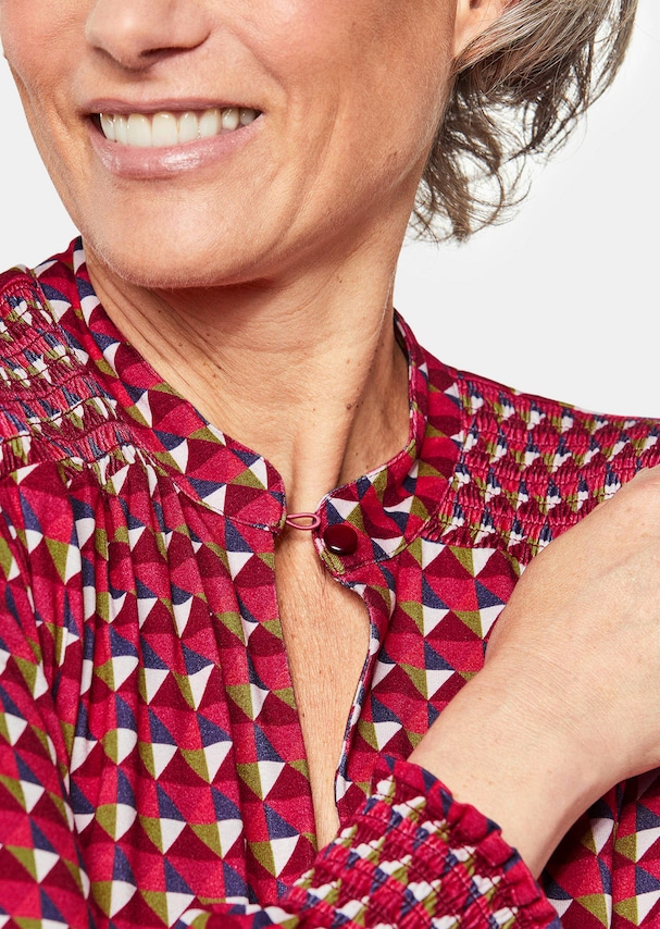 Jersey blouse met modieuze smokwerkdetails 4