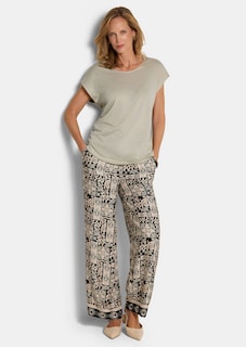 Näyttävä, hohtava toppi thumbnail 2