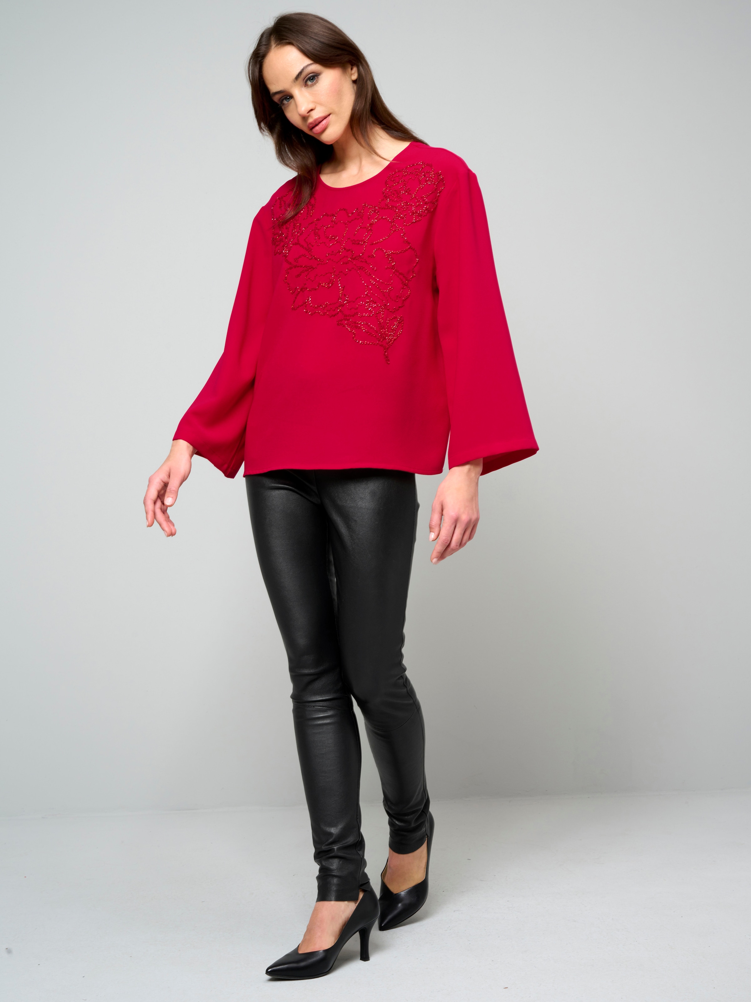 Bluse mit Perlenmotiv 6