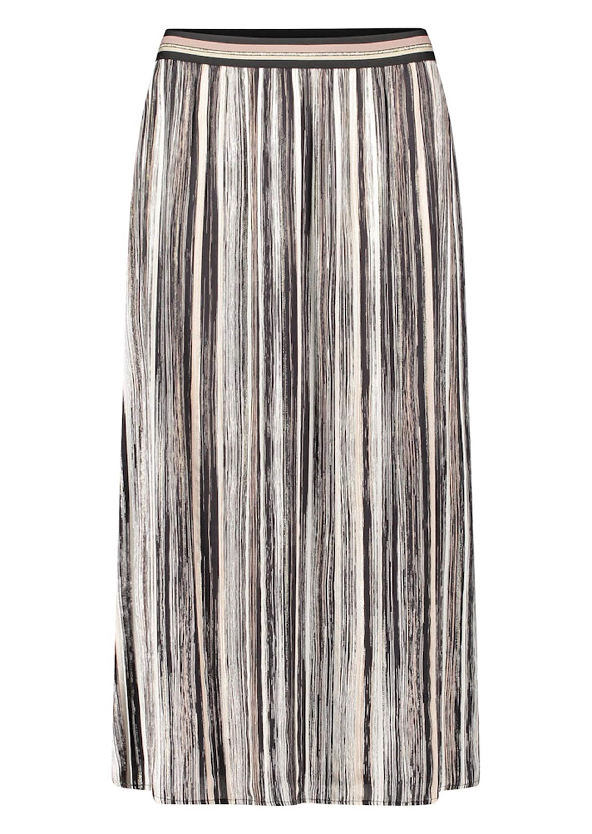 Schwingender Jupe mit glänzenden Streifen