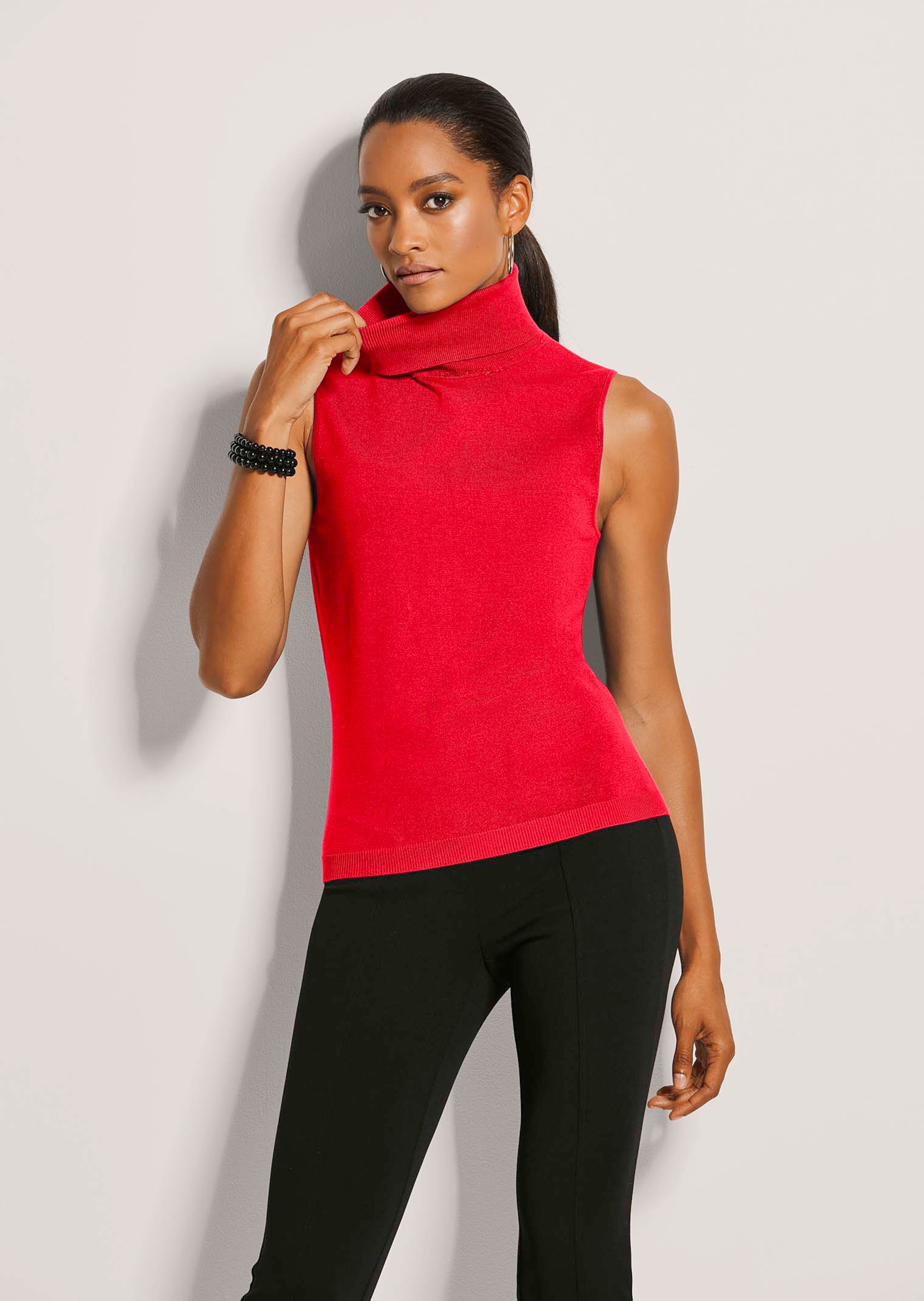 Ärmelloser Rollkragenpullover