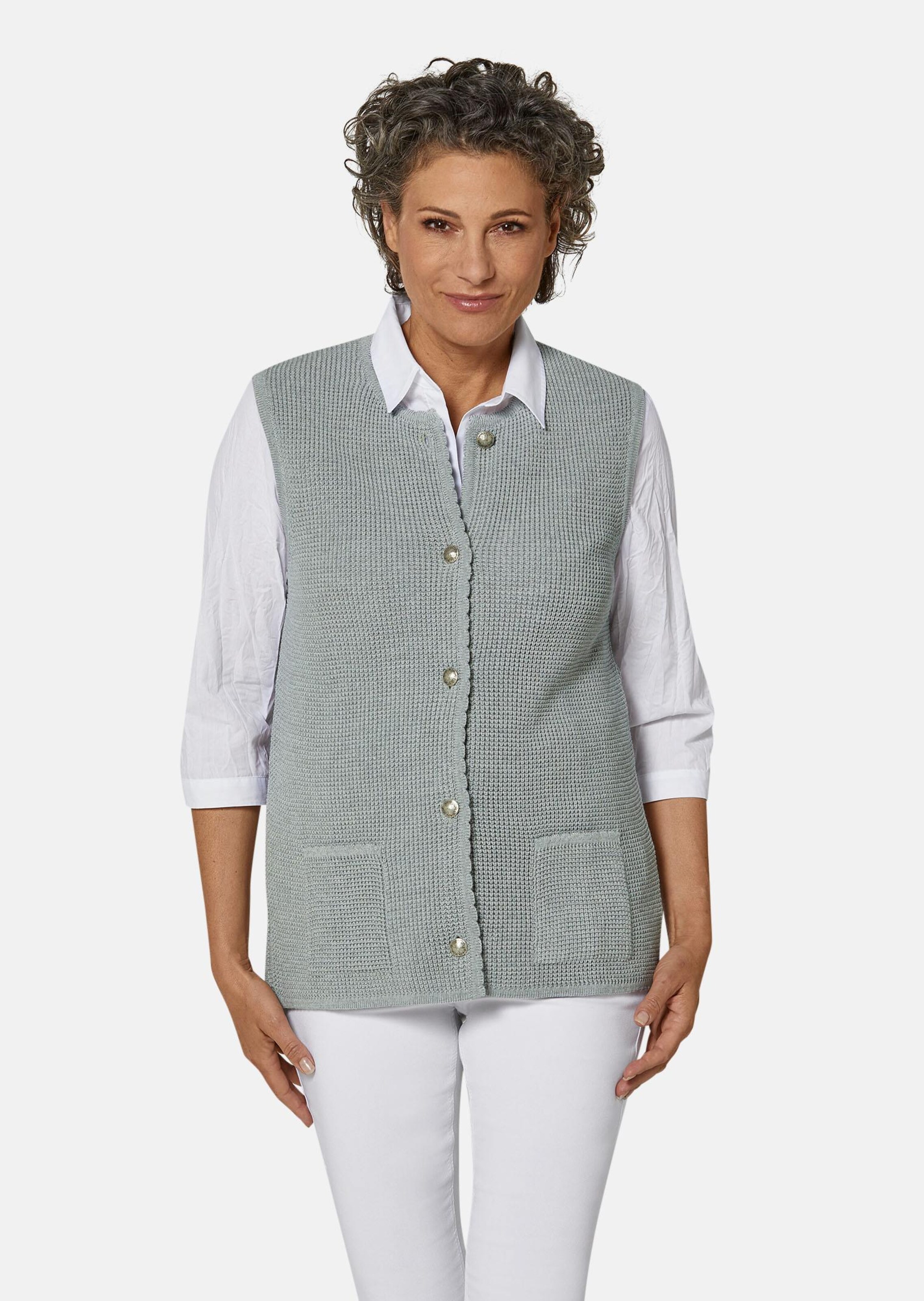 Goed in model blijvend tricot vest met mooie knopen