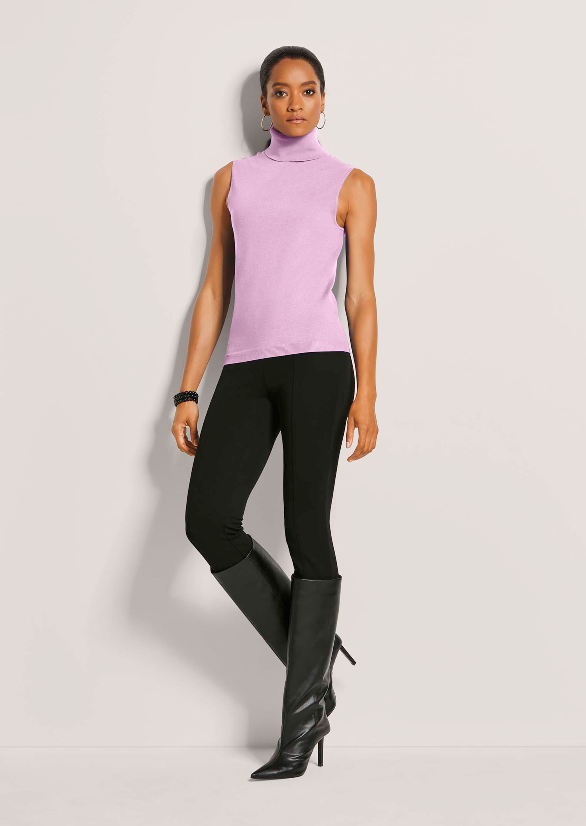 Sleeveless turtleneck jumper in wild rose | MADELEINE Fashion