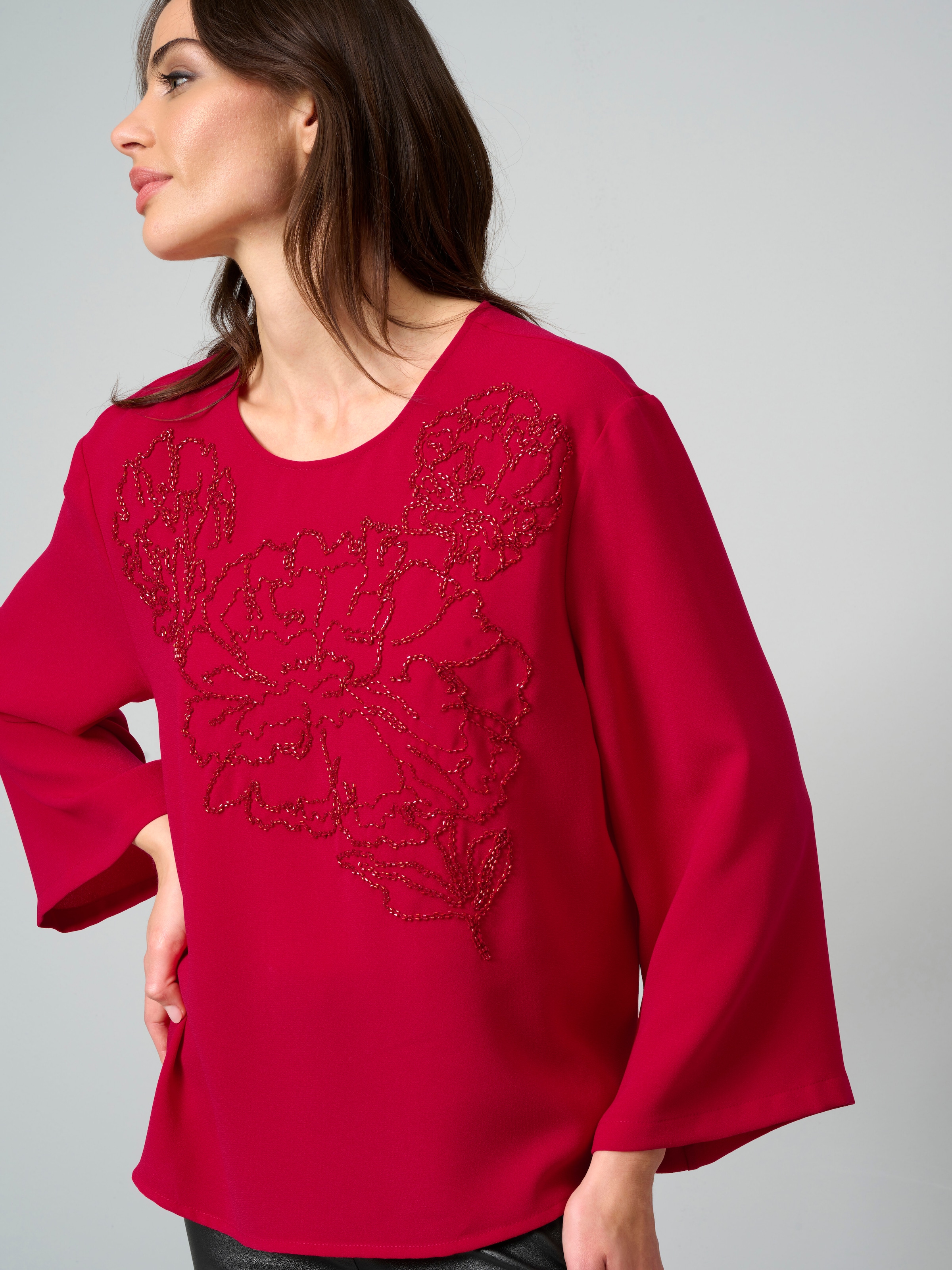 Bluse mit Perlenmotiv 4