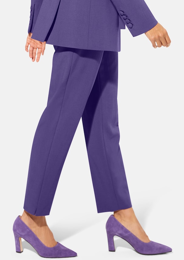 Trousers with creases and hem slits 3