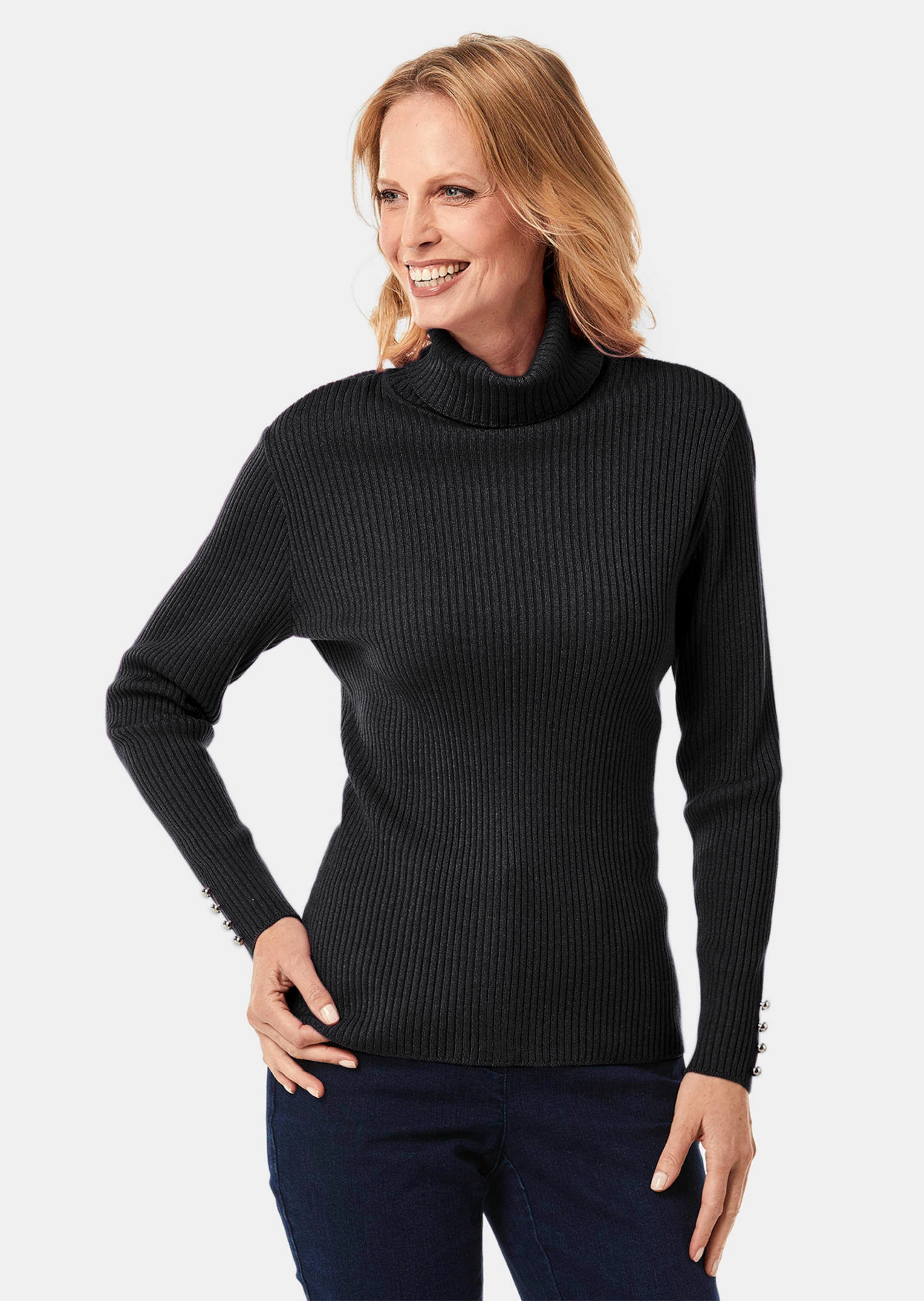 Eleganter Rollkragenpullover mit optischen Knöpfen