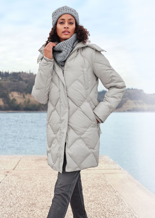 Quilted down coat with functional details